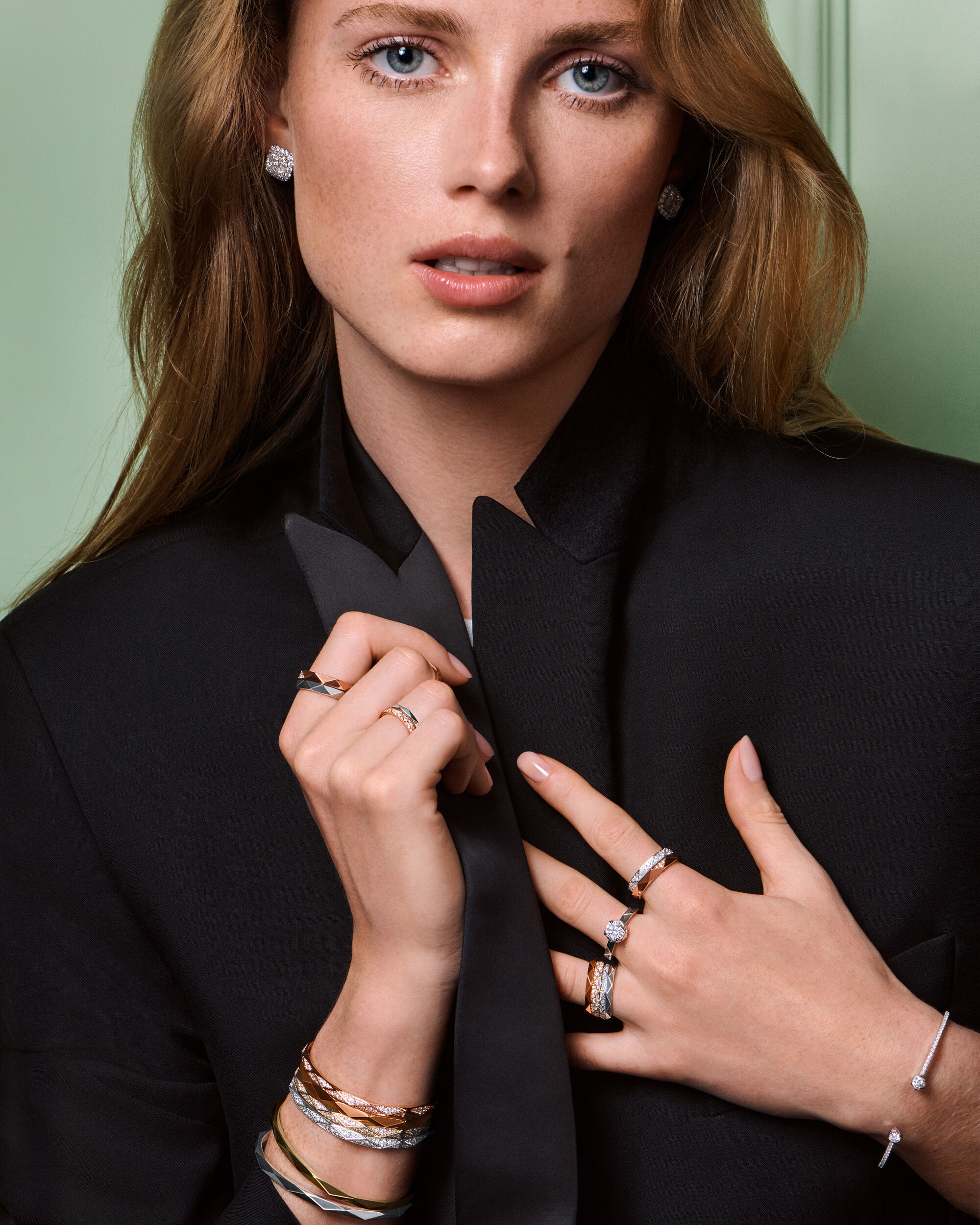 Image of model wearing Laurence Graff Signature Collection bangles and rings 