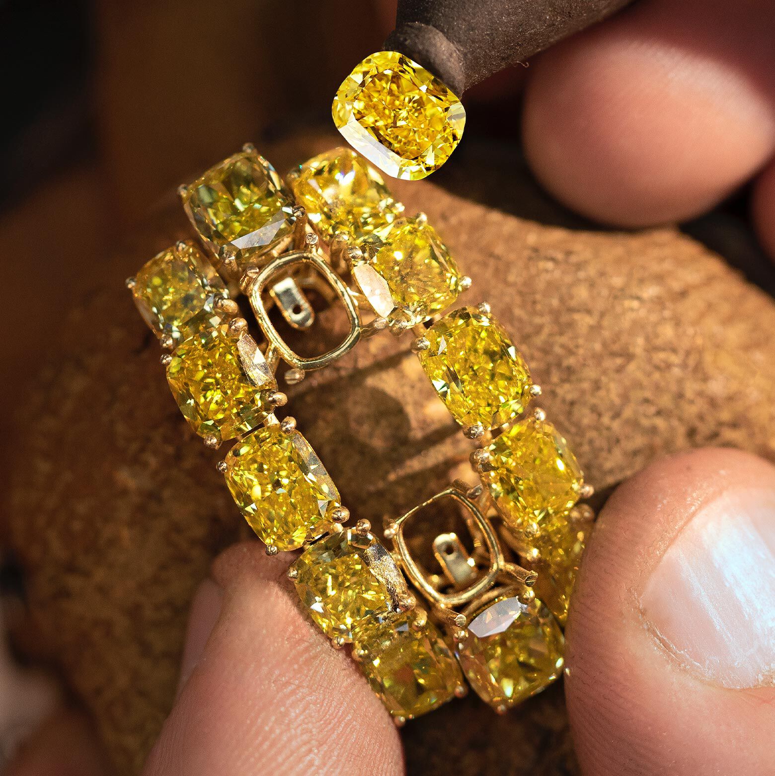 Graff Yellow and White Diamond Oval Secret Watch being created in Graff workshop by craftsman