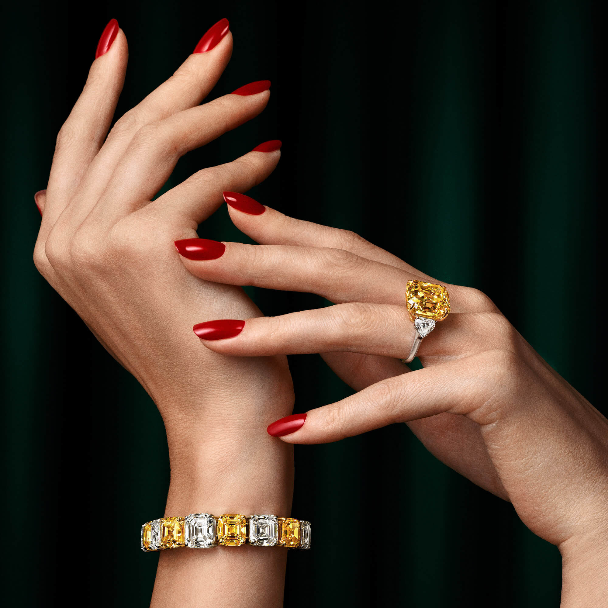 Model with yellow and white diamonds bracelet and yellow diamond ring