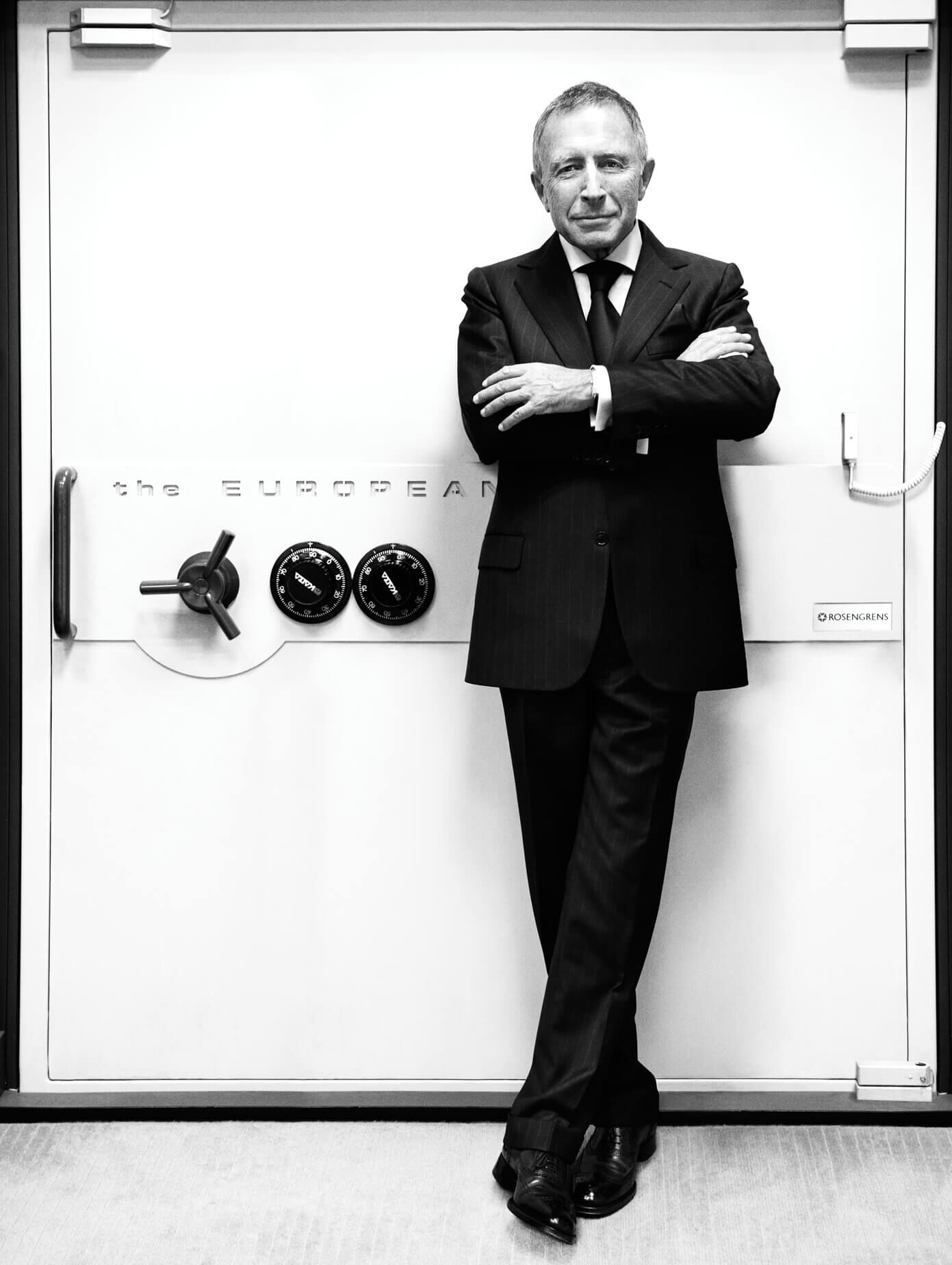 Mr Laurence Graff OBE stands in front of a jewellery vault