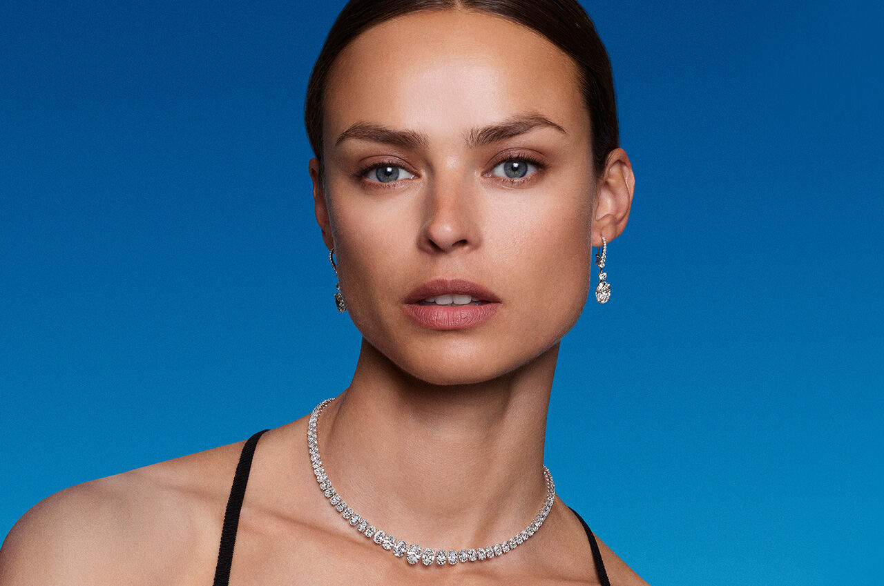 Graff Endless Summer Collections - Model wears Graff Yellow Gold and Diamond Be Together Bracelets, Necklace and Earrings