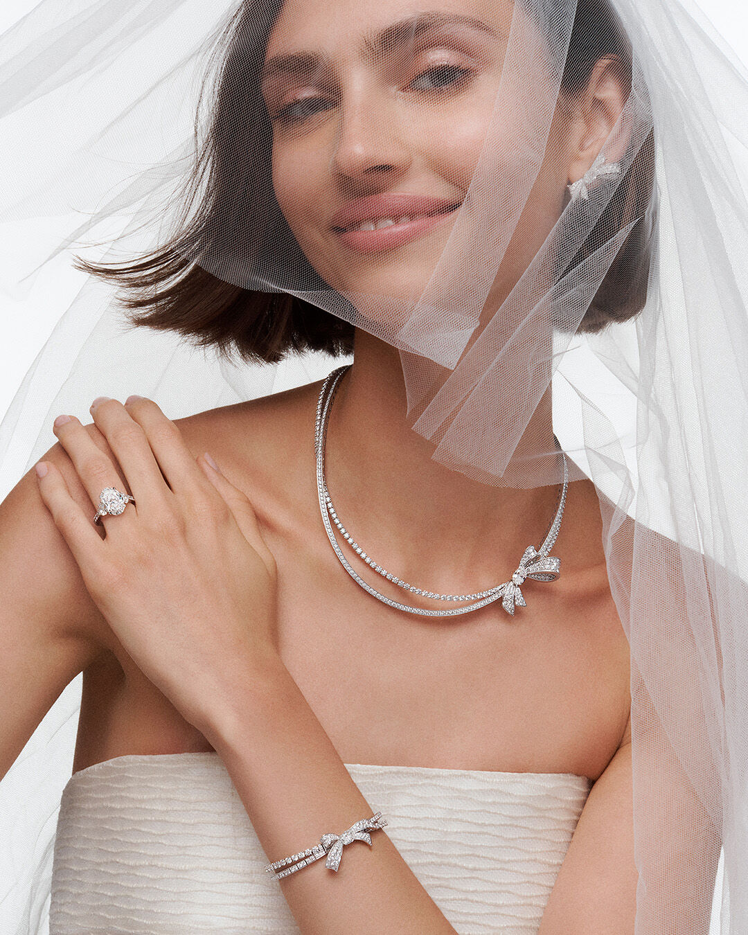 Bridal Jewellery - image shows model wearing Graff Tilda's Bow bridal jewellery