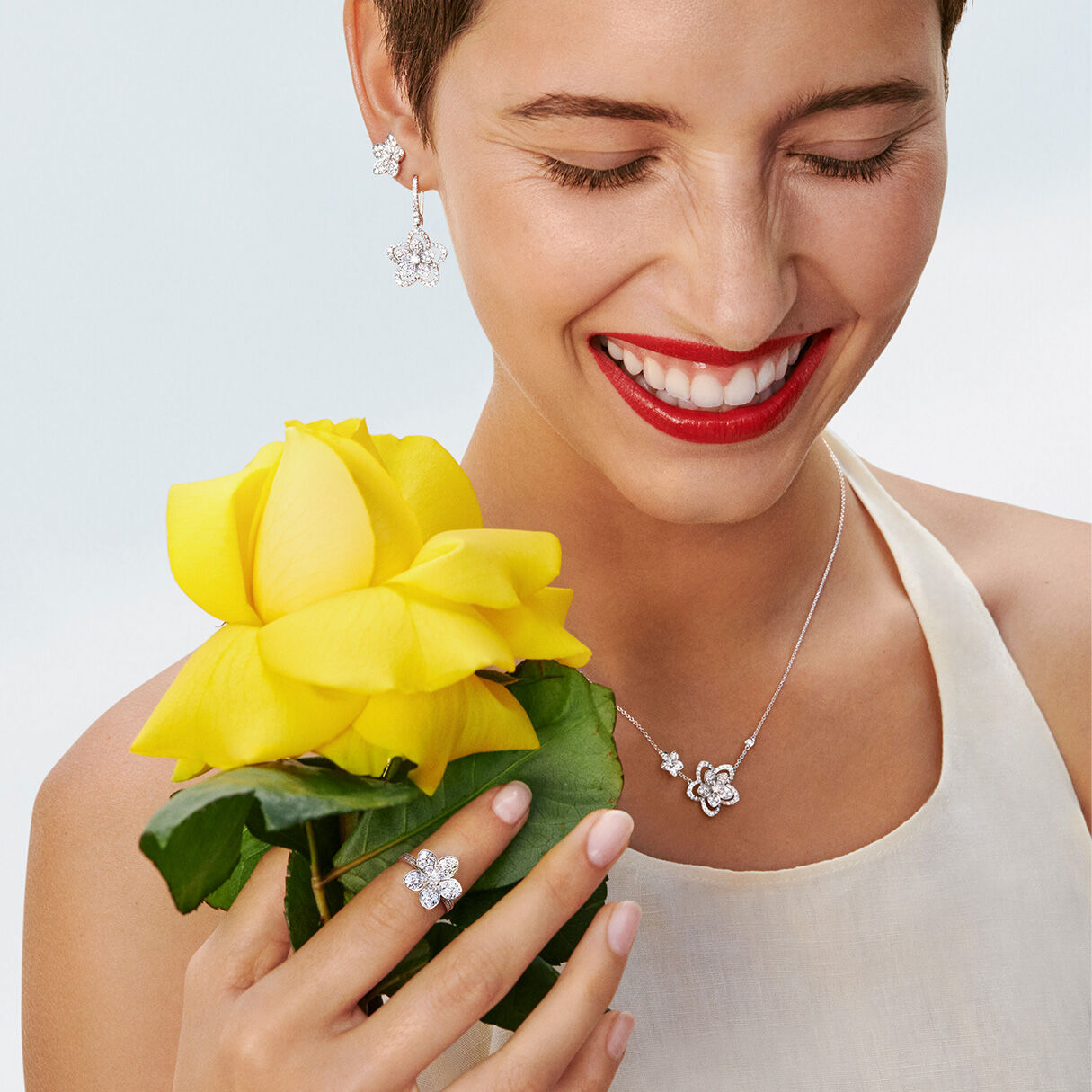 Model wearing Graff Diamond Collections Wild Flower Earrings, Necklace and Ring