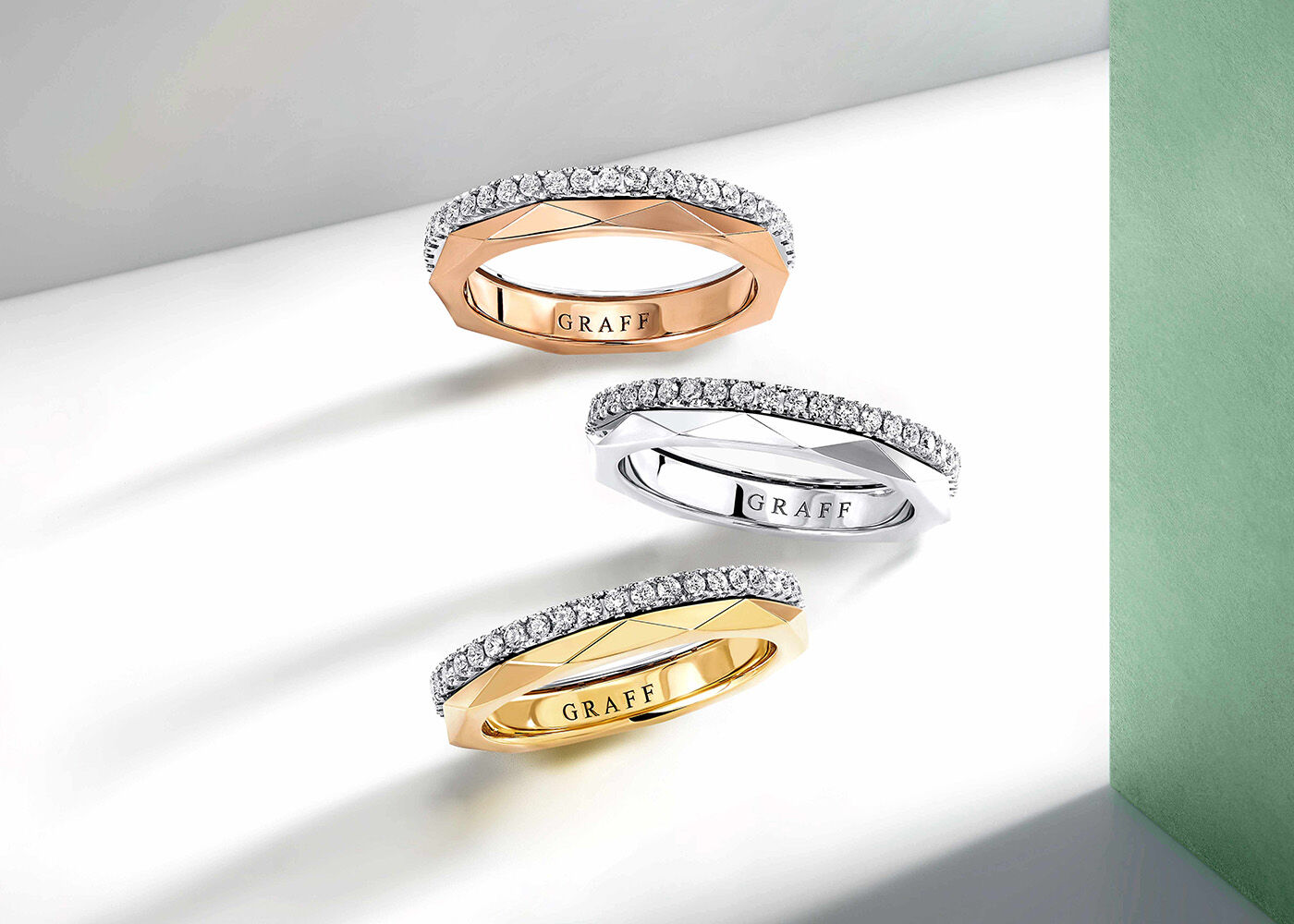 Image shows model hands wearing Laurence Graff Signature collection rings