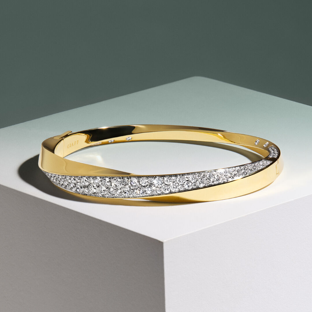 Gold bracelets from Graff. Image of Gold Butterfly bangle