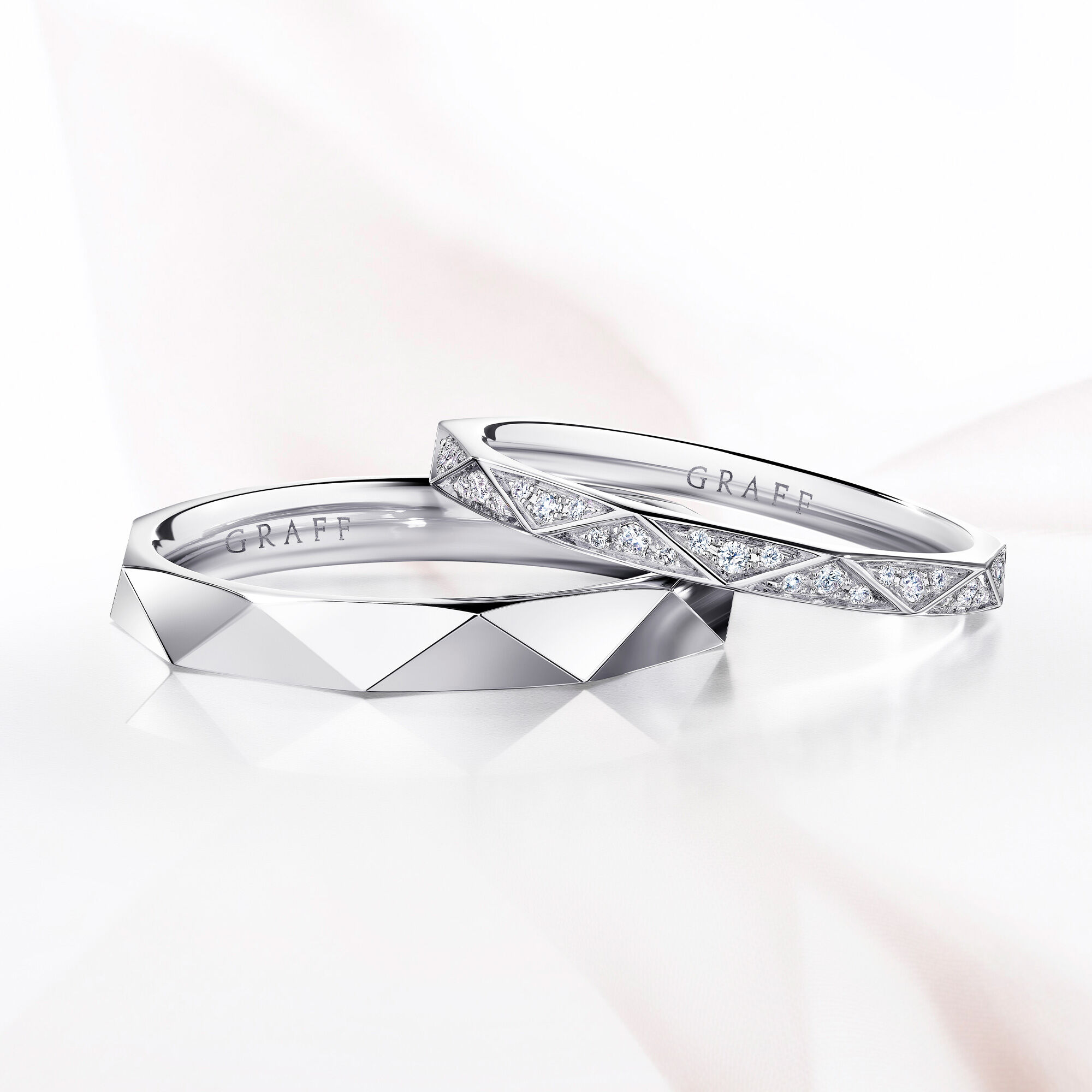 Close up of two Laurence Graff Signature wedding bands 