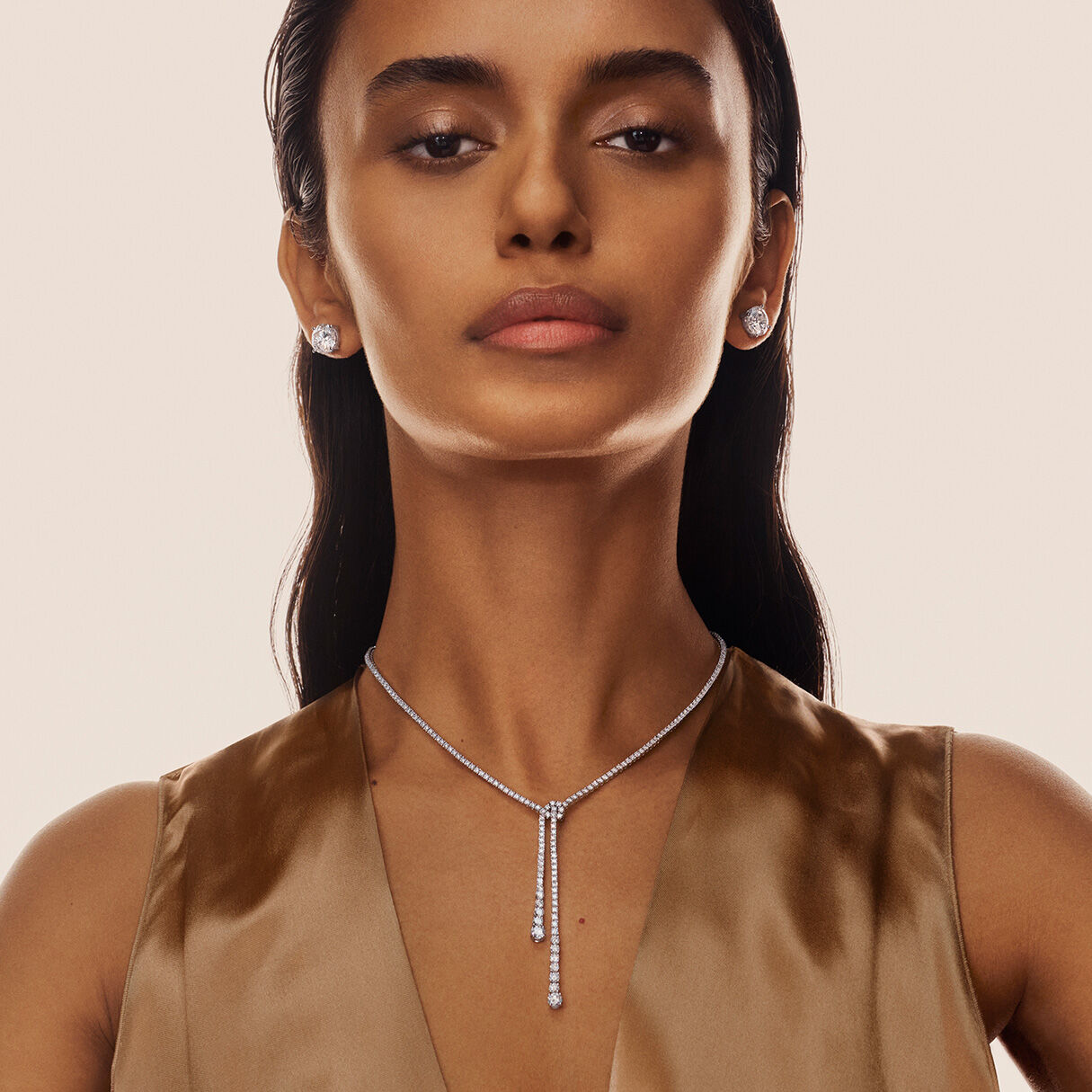 Model wears diamond engagement rings