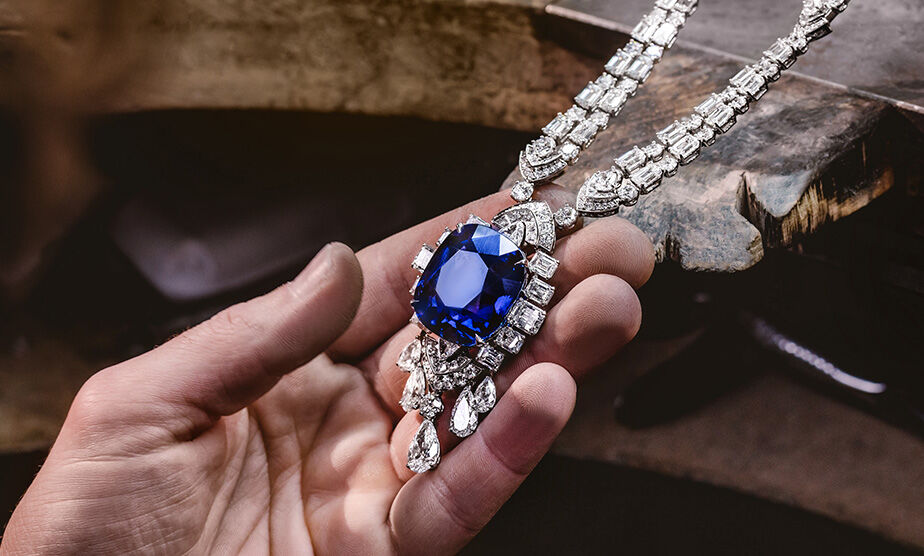 High Jewelry. Displayed here is a high jewelry necklace with a sapphire stone