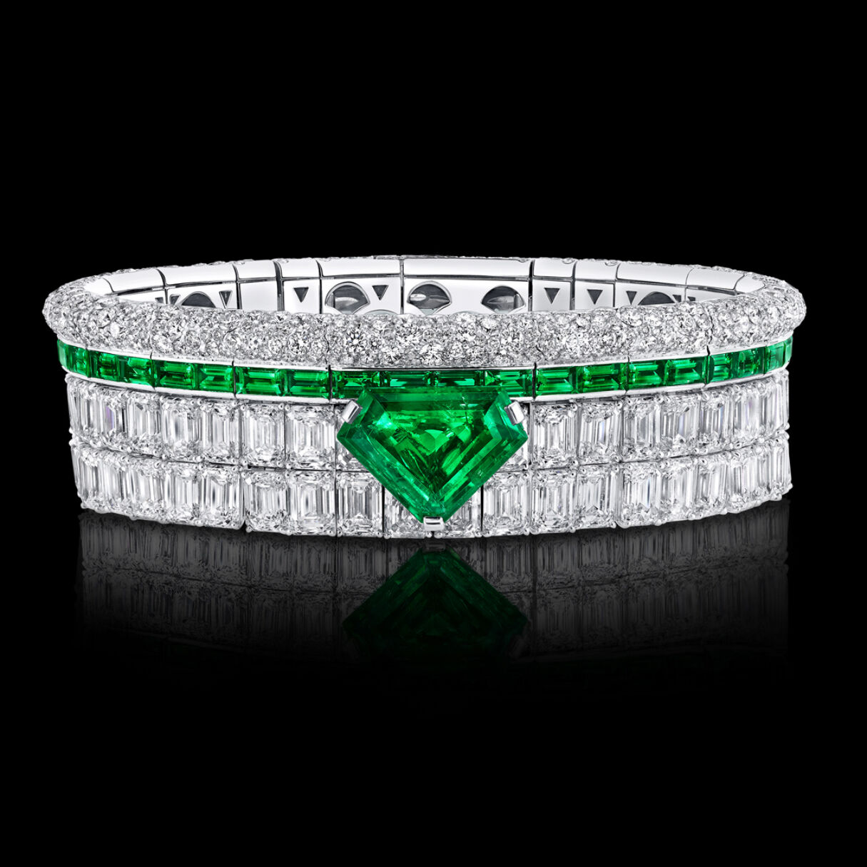 Image shows Graff Emerald and White Diamond High Jewellery bangle