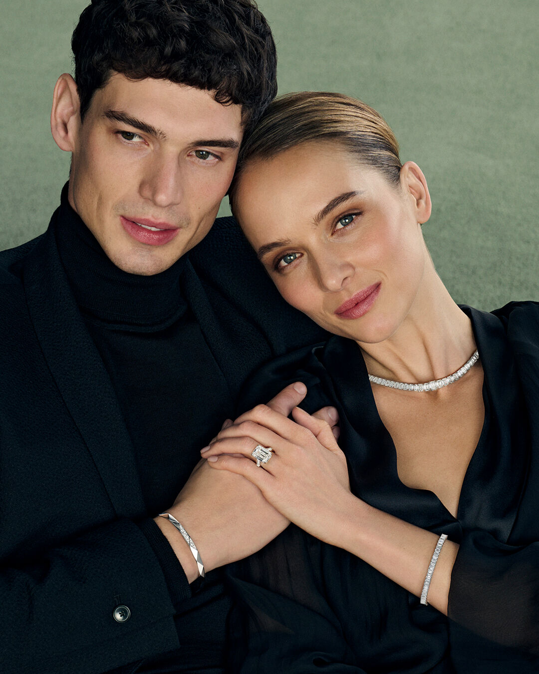 Image shows model wearing Laurence Graff Signature rings and bangles