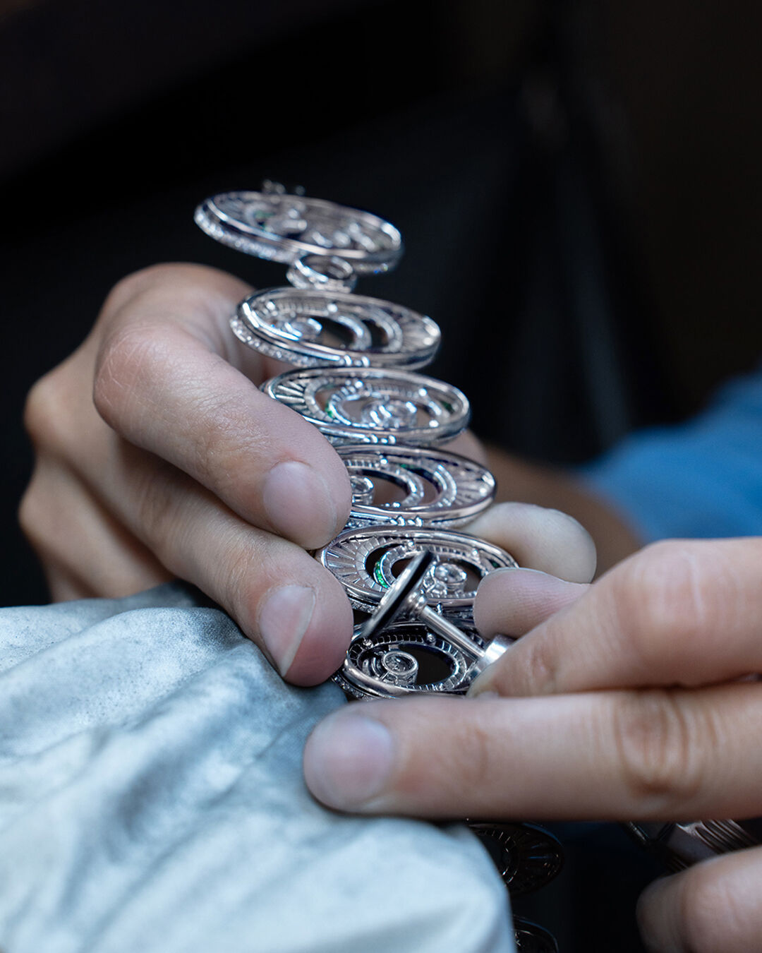 Graff The Gift of Love High Jewellery necklace, image shows Pear Shape 13.51 carat Yellow Diamond being set in Graff workshop.