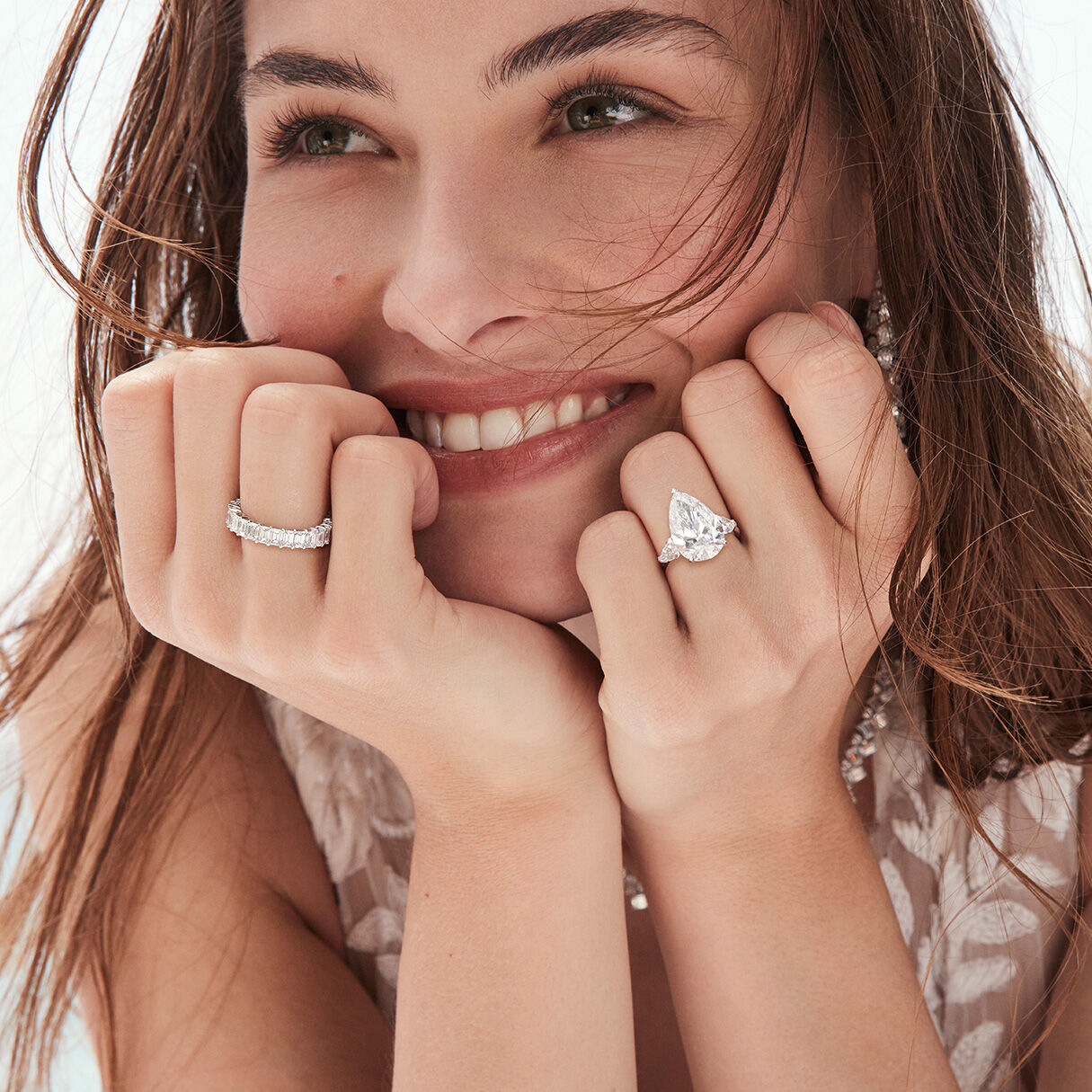 Model wearing Graff Diamond Engagement Ring and Diamond Wedding Band