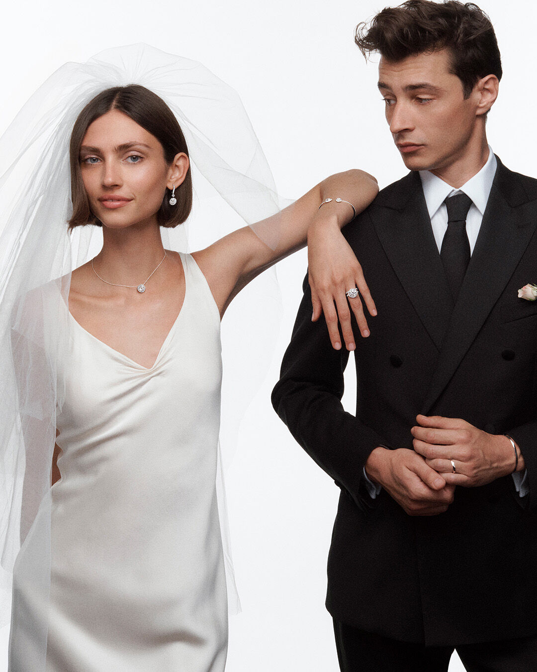 Bride and Groom wearing jewellery from the Graff bridal collection