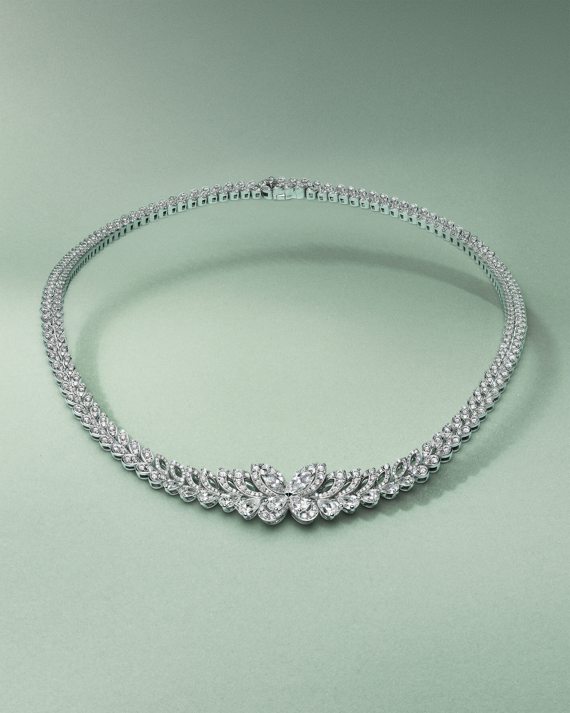 White diamond Jewellery - image shows model wearing Graff Tilda's Bow collection and solitaire ring