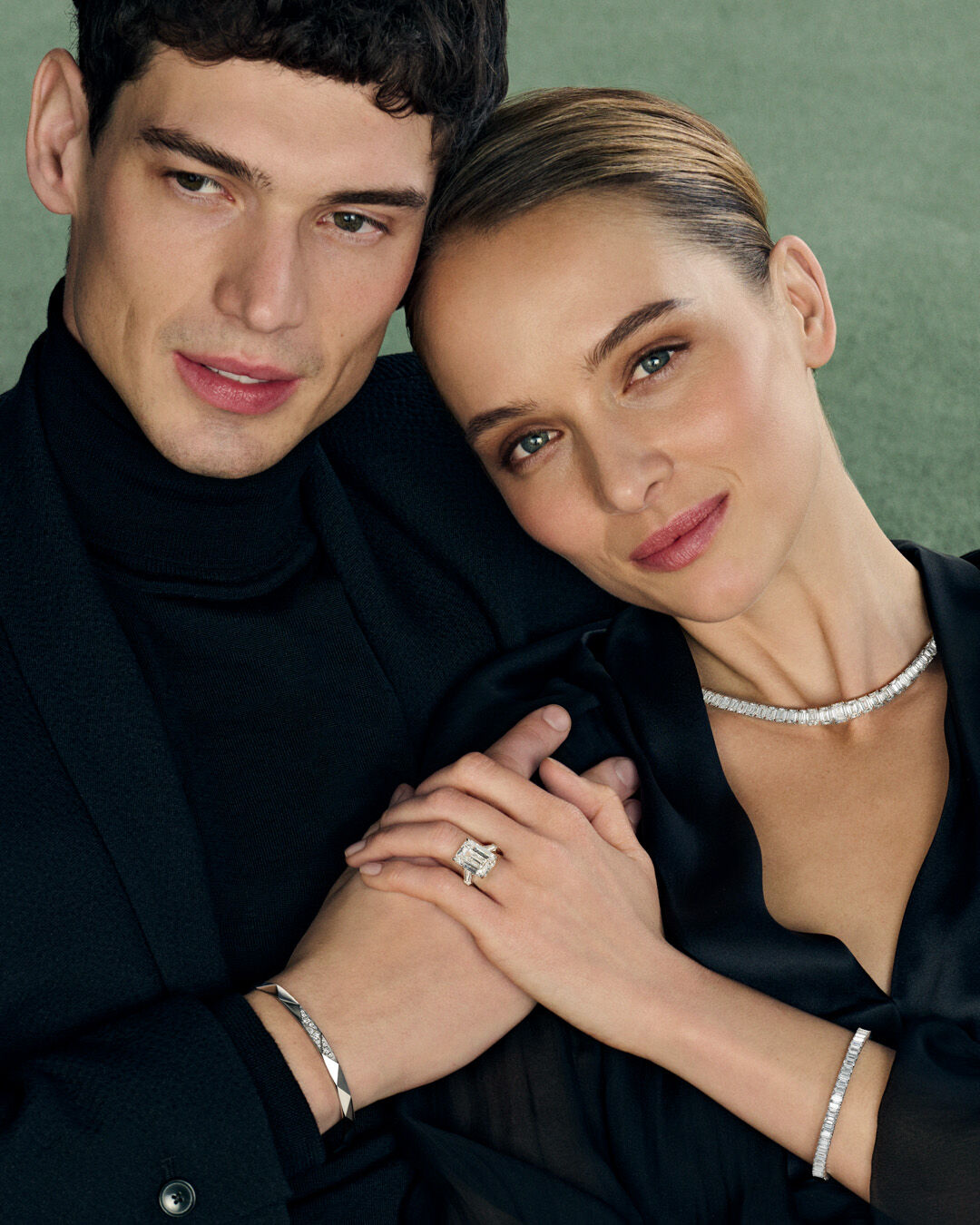 Image shows model wearing heart shape diamond engagement ring