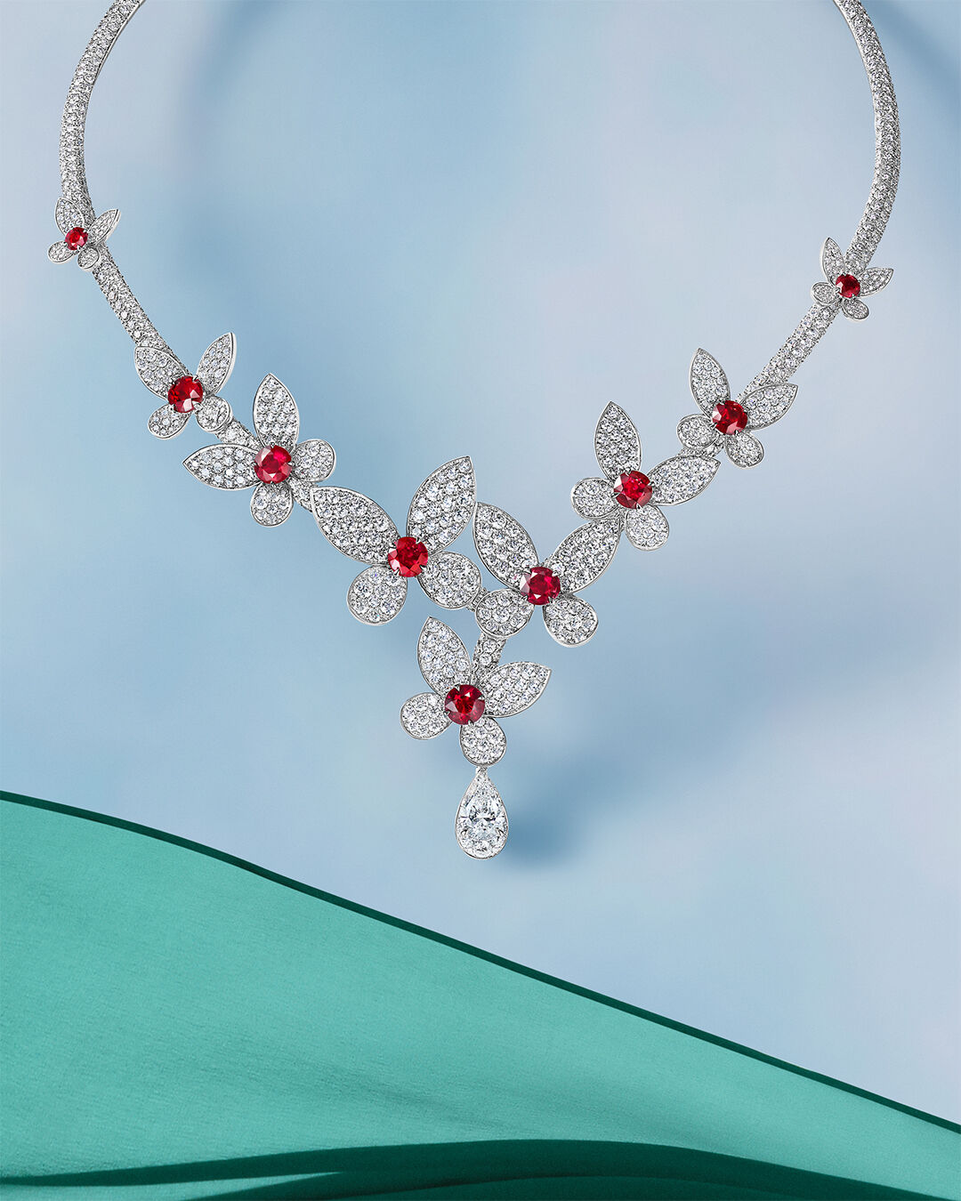 Image shows Graff Butterfly Pave Ruby and Diamond necklace