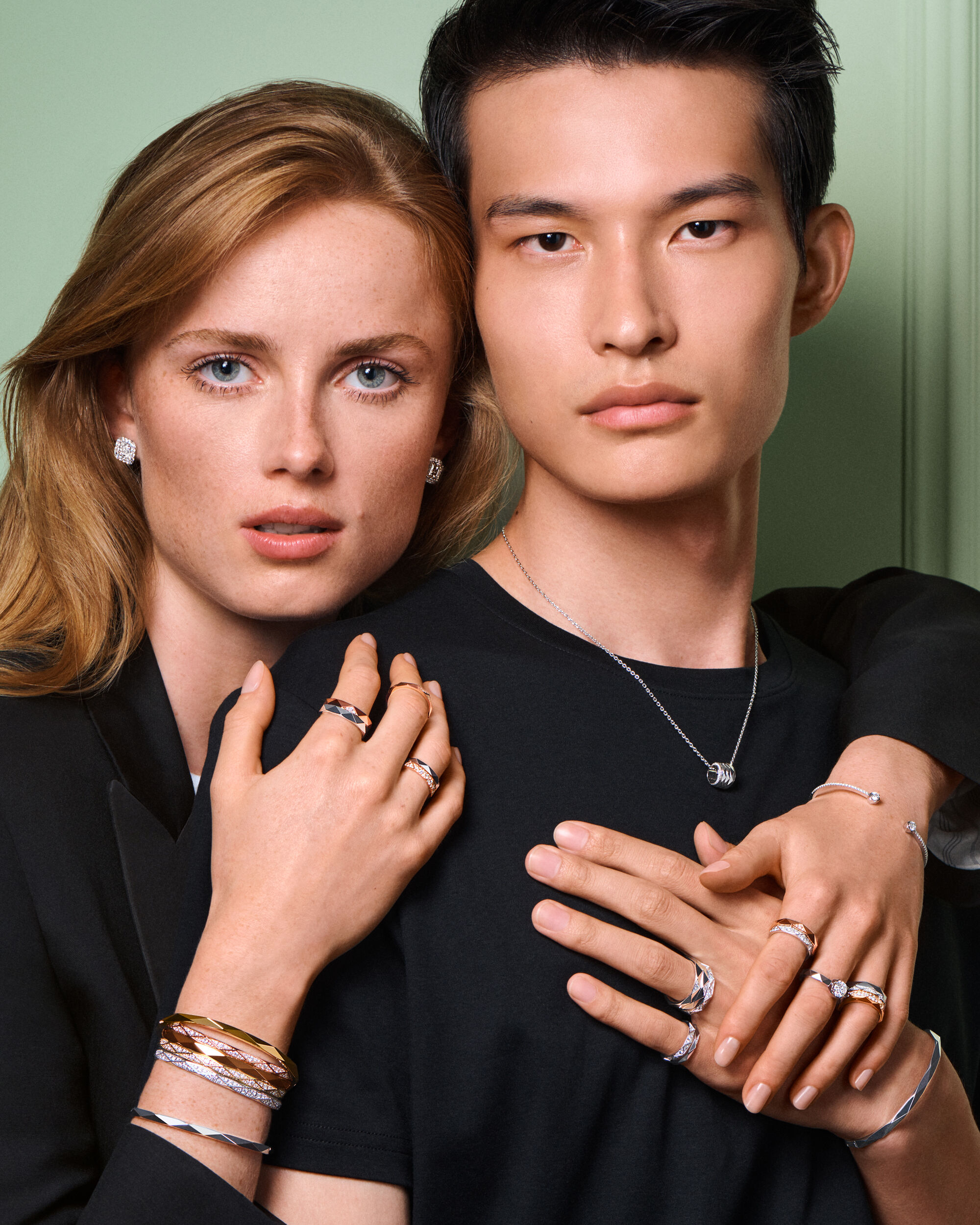 Image of female and male model wearing Laurence Graff Signature jewellery