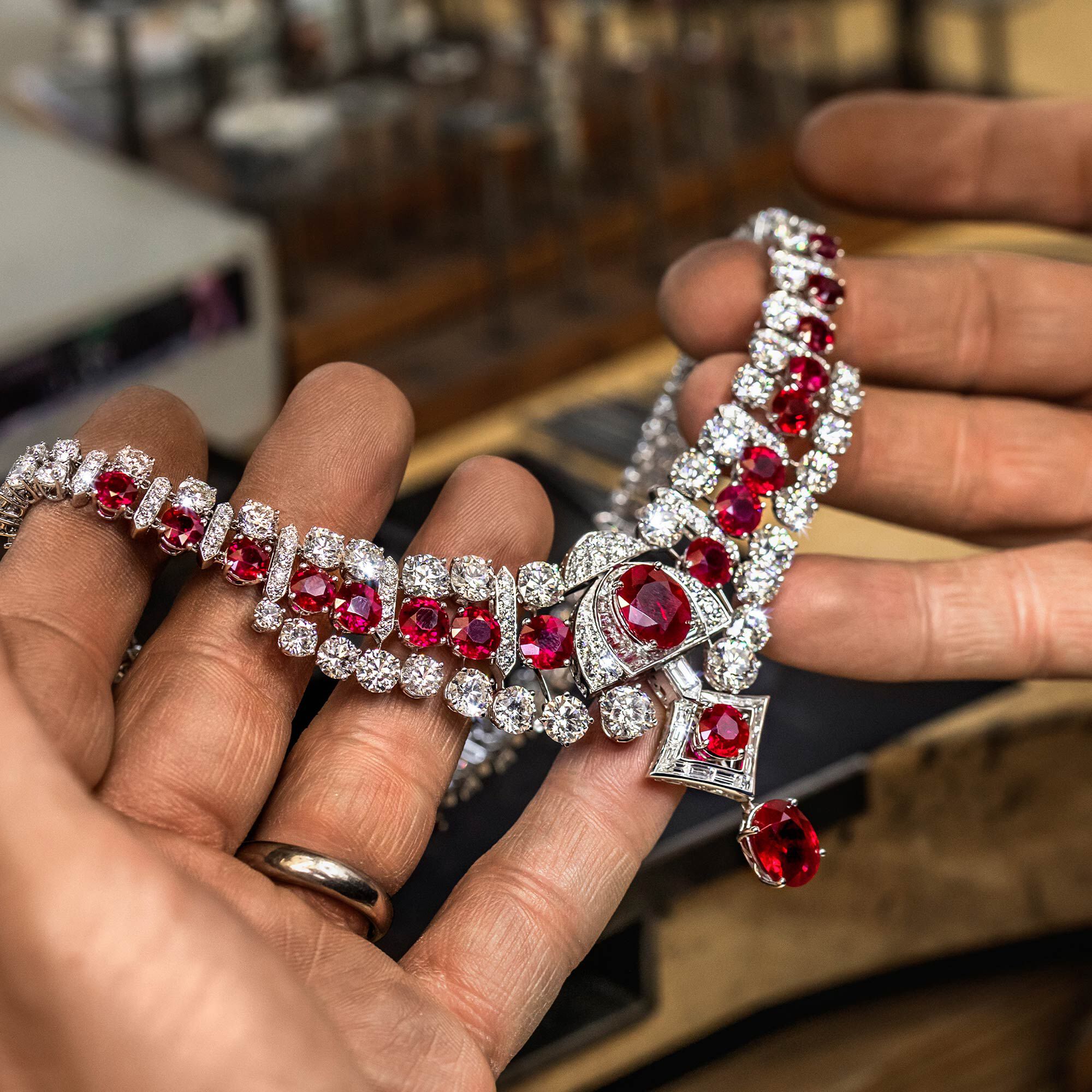 Craftsman adding the finishing touches to a Graff Ruby and Diamond High Jewellery Necklace
