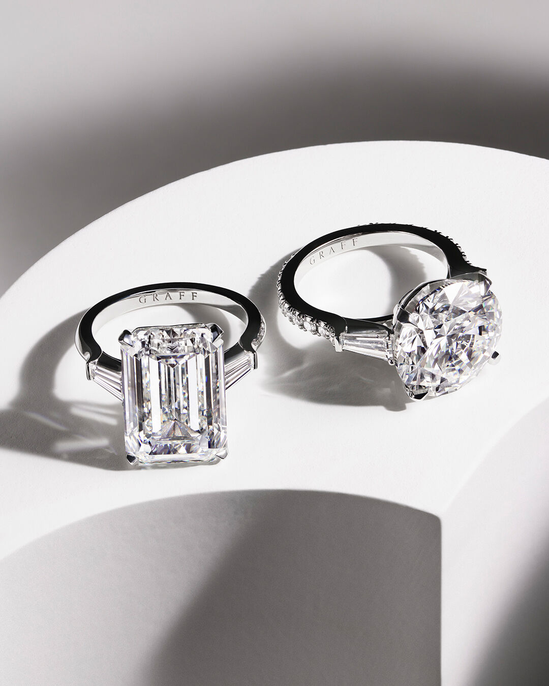 Engagement Rings - image shows Graff Emerald Cut and Round Diamond Engagement Rings