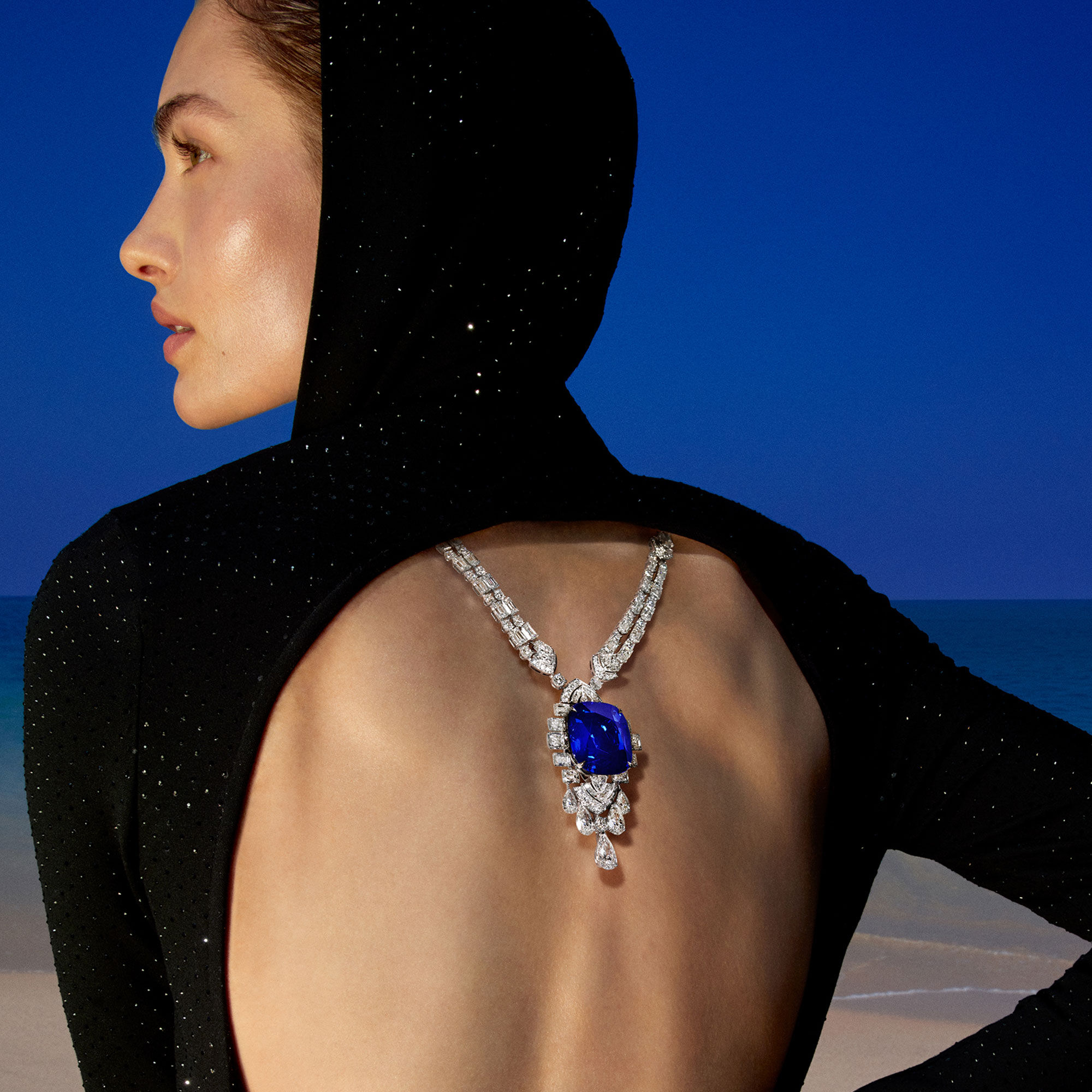 Model wears Graff sapphire and white diamond high jewellery 