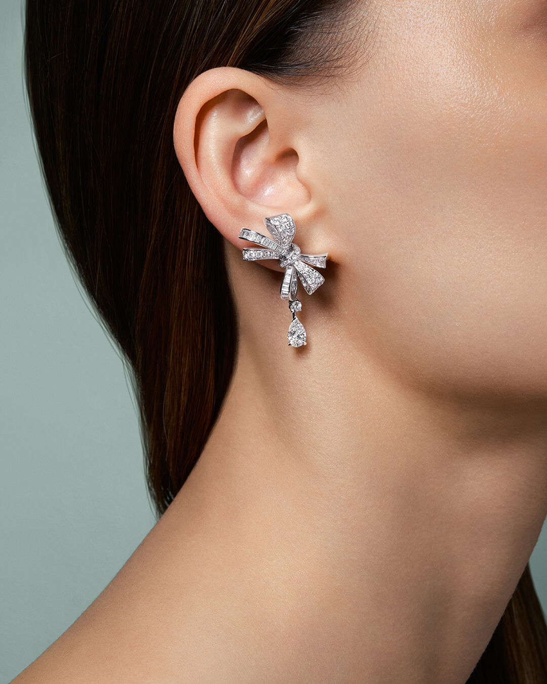 Model wears Tilda's Bow diamond drop earrings 