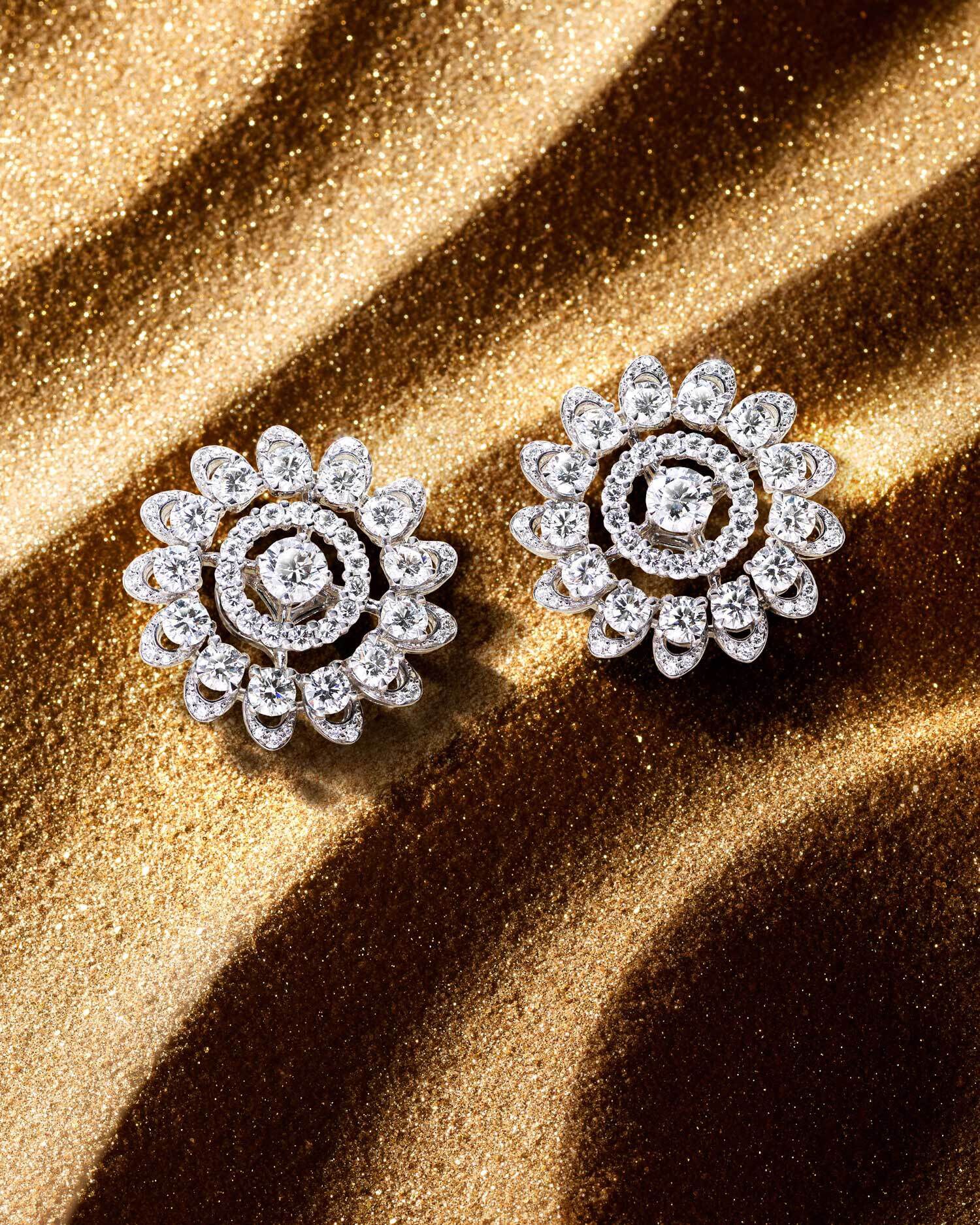 The abstract Graff Gateway motif is showcased in a pair of diamond earrings