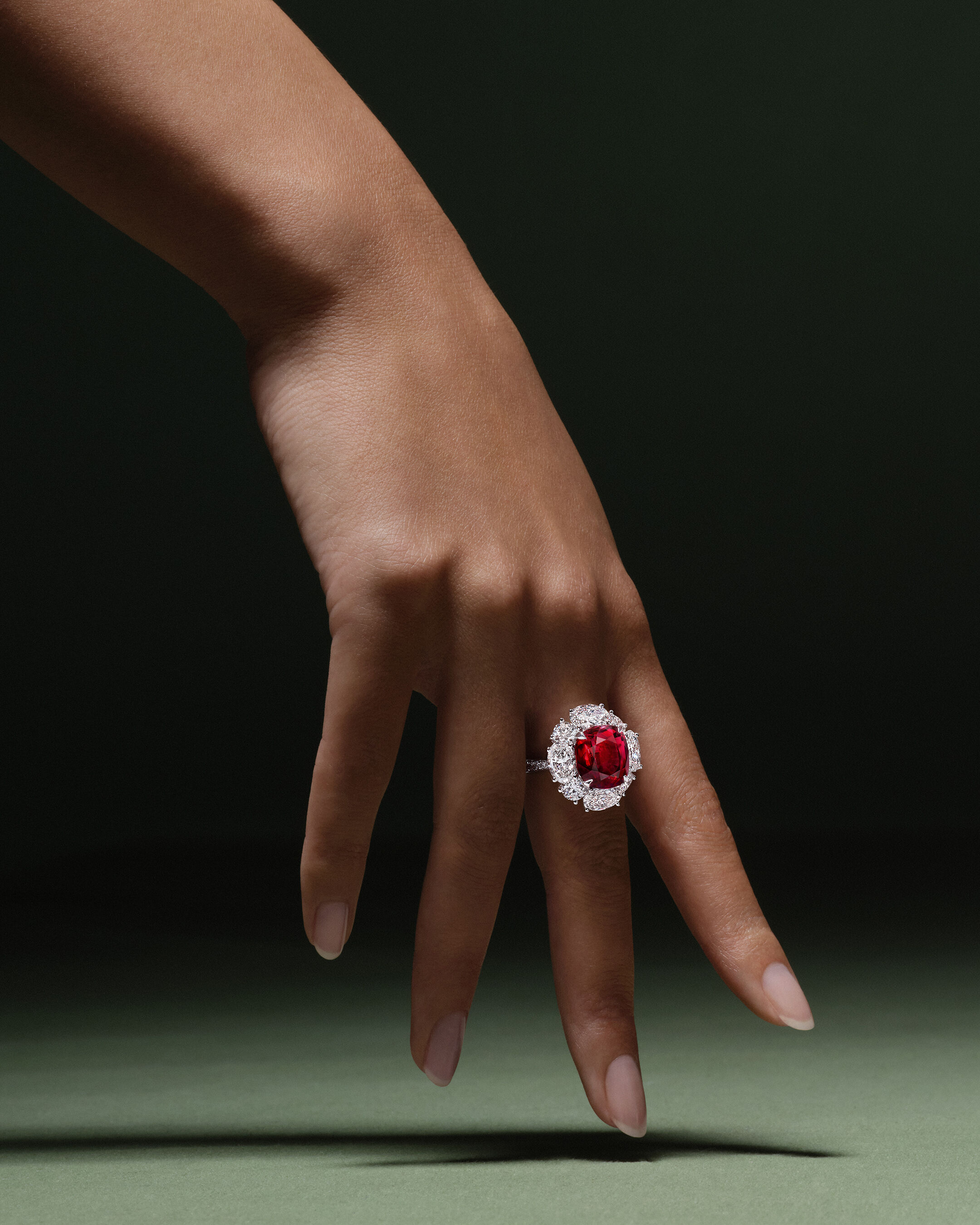 Image shows model wearing Graff Butterfly bracelet and ring