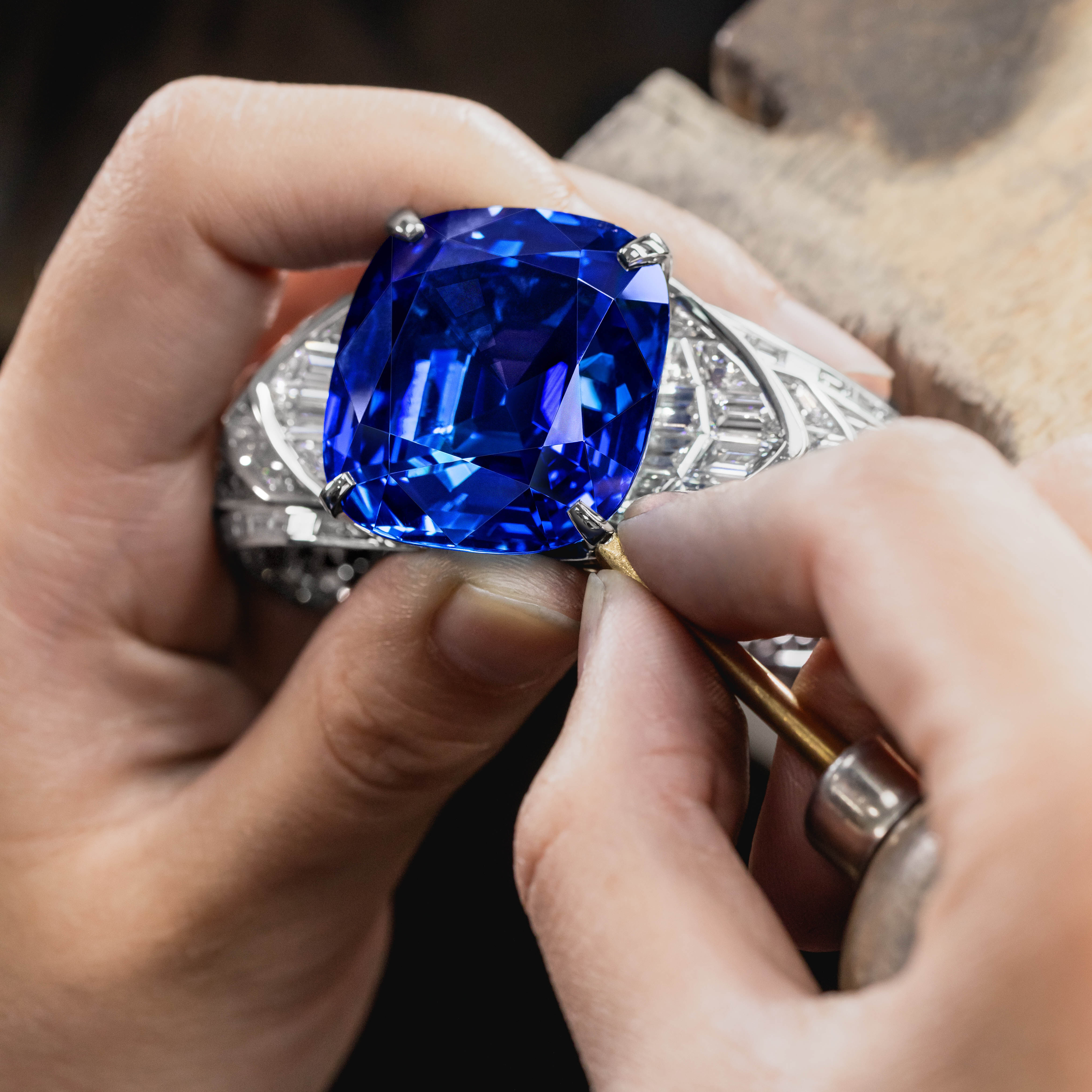 Image of Graff Sapphire High Jewellery  Bangle being finished by Graff craftsman in workshop