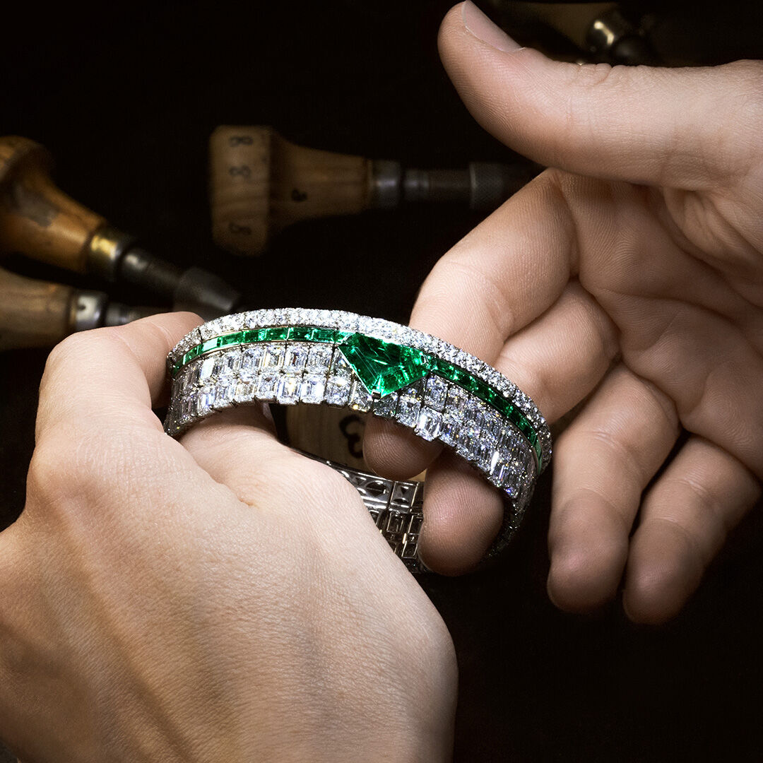 Image of Graff craftsman finishing Emerald High Jewellery bangle in Graff Workshop