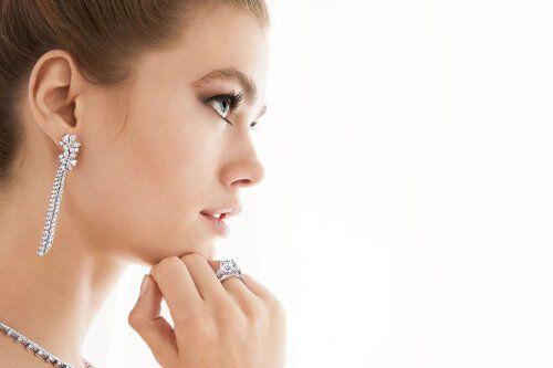 Close up of a model wearing Graff diamond jewellery