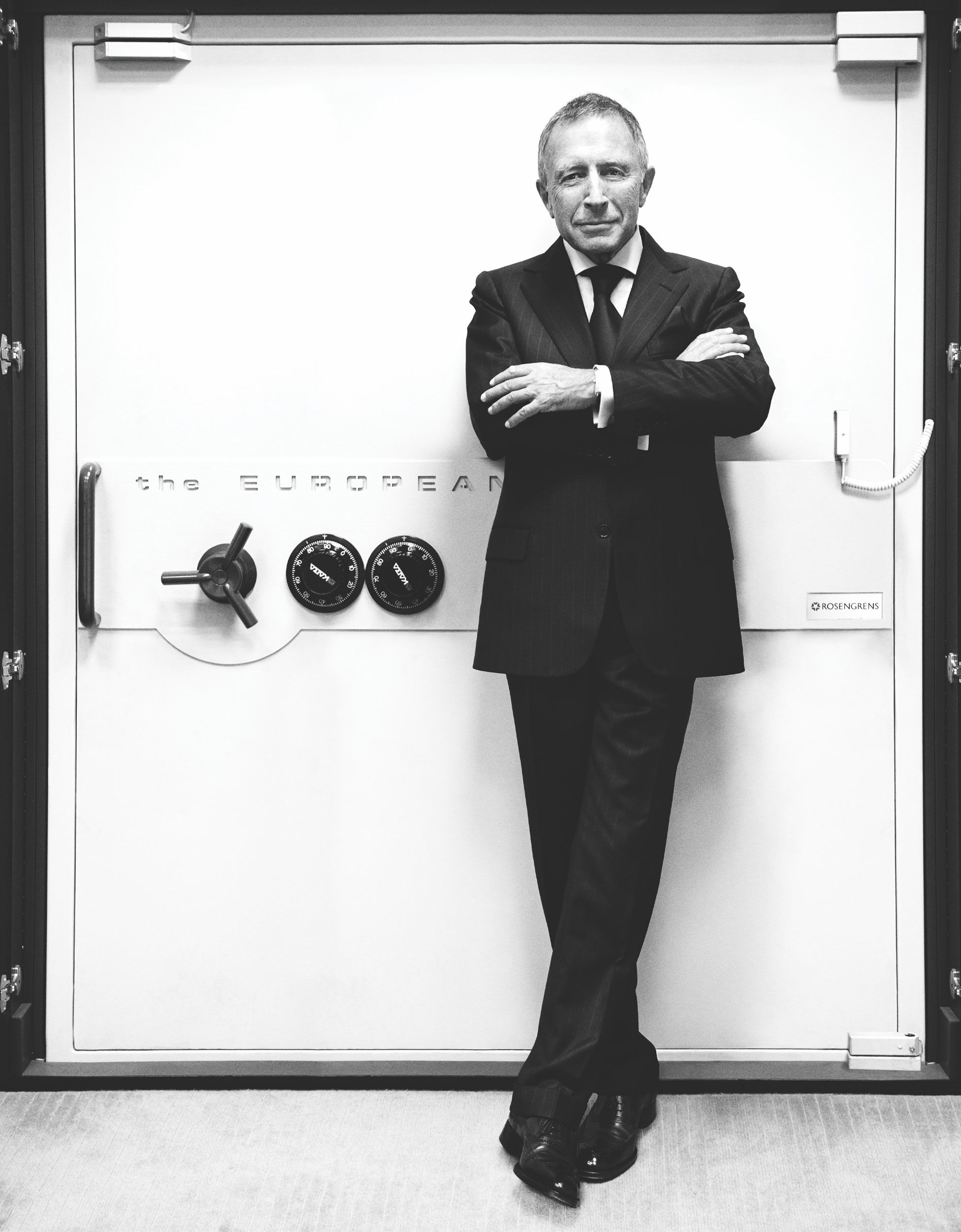 Mr Laurence Graff OBE stands in front of a vault