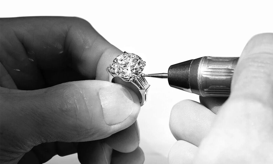 Graff Craftsman adding the finishing touches to a Graff Diamond Engagement Ring