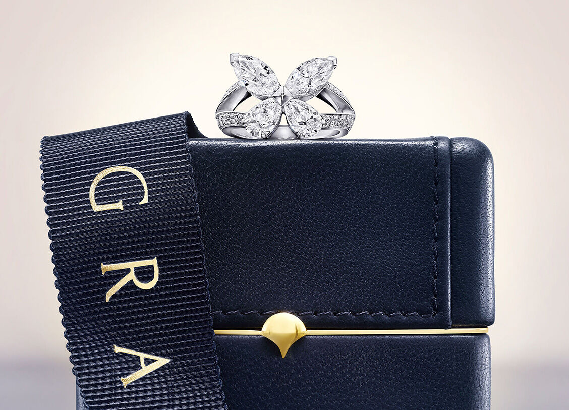 Diamond Butterfly ring with signature Graff box and ribbon