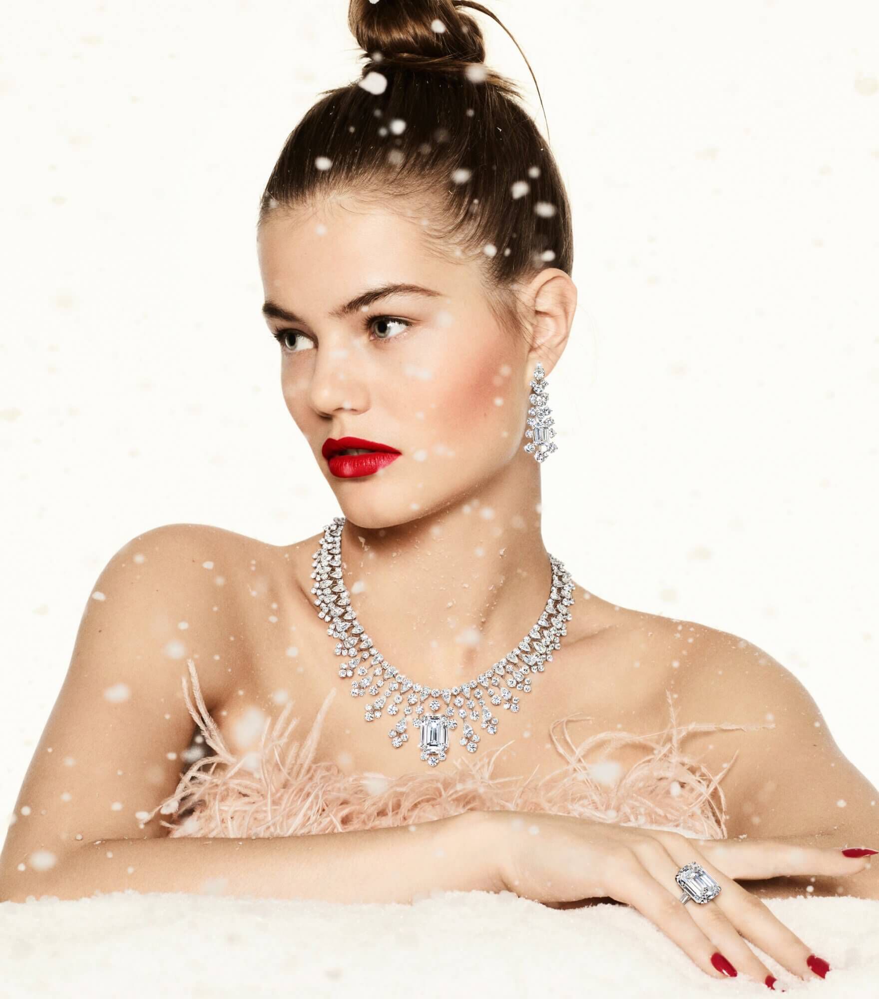 Model wearing Graff high jewellery diamond necklace, earrings and ring
