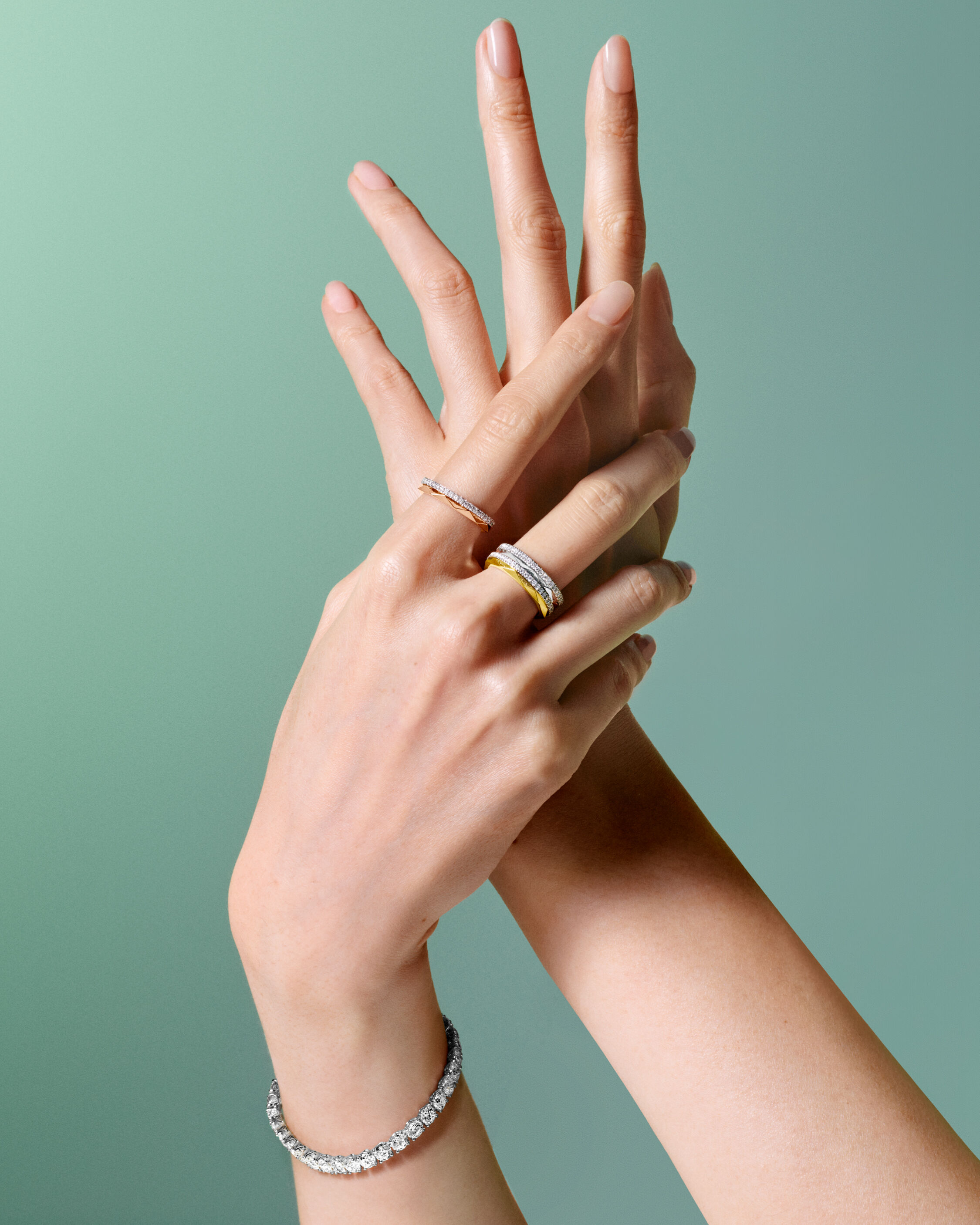 Image shows model hand wearing Laurence Graff Signature Rings