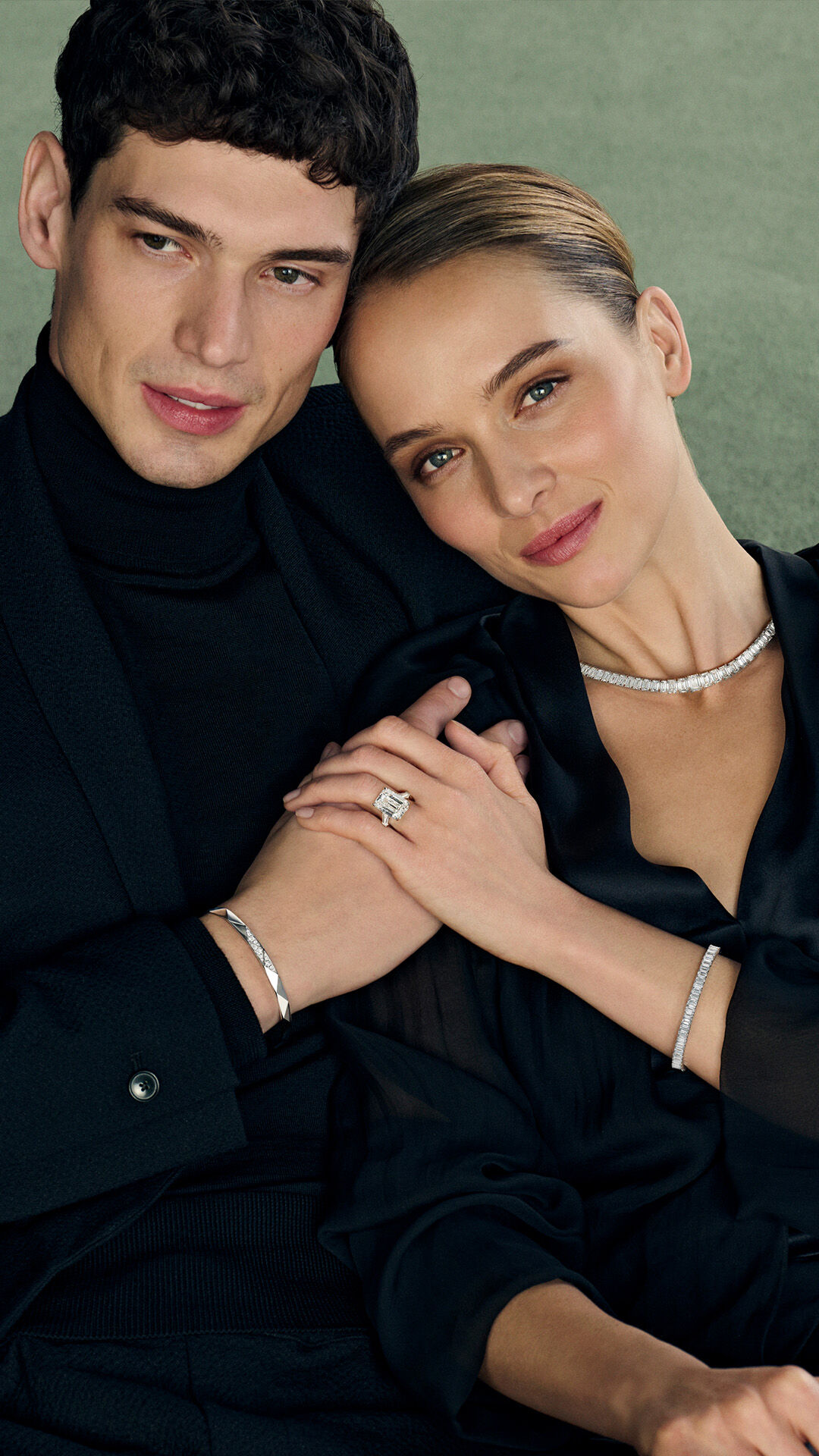 Image shows model wearing Graff oval diamond jewellery and icon oval engagement ring