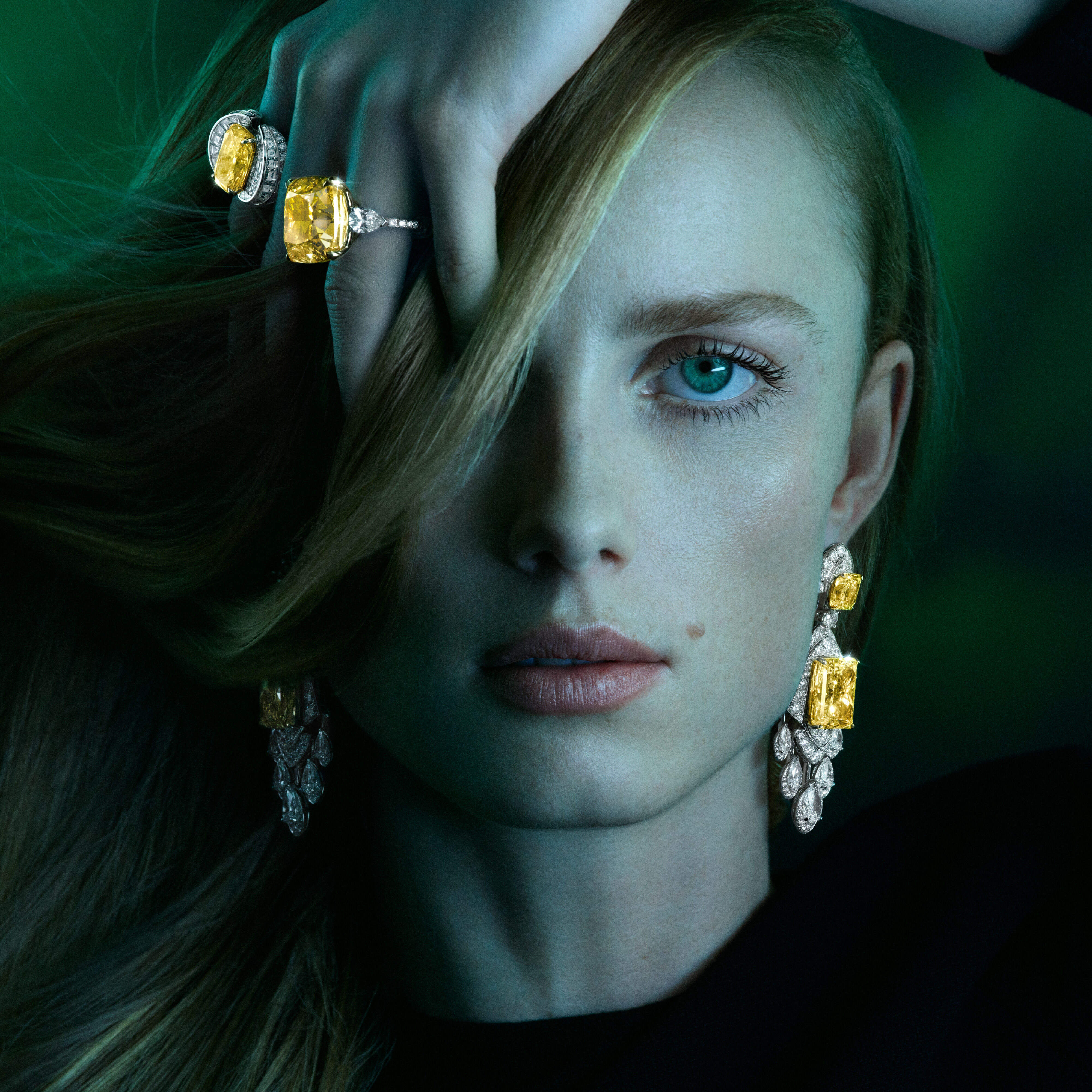 Image of model wearing Graff Galaxia Yellow Diamond Rings and Earrings