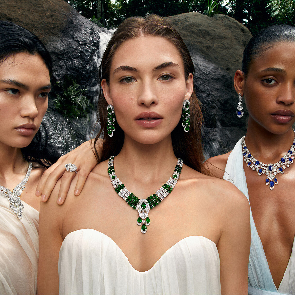 Models wearing Graff sapphire, emerald and diamond high jewellery suites
