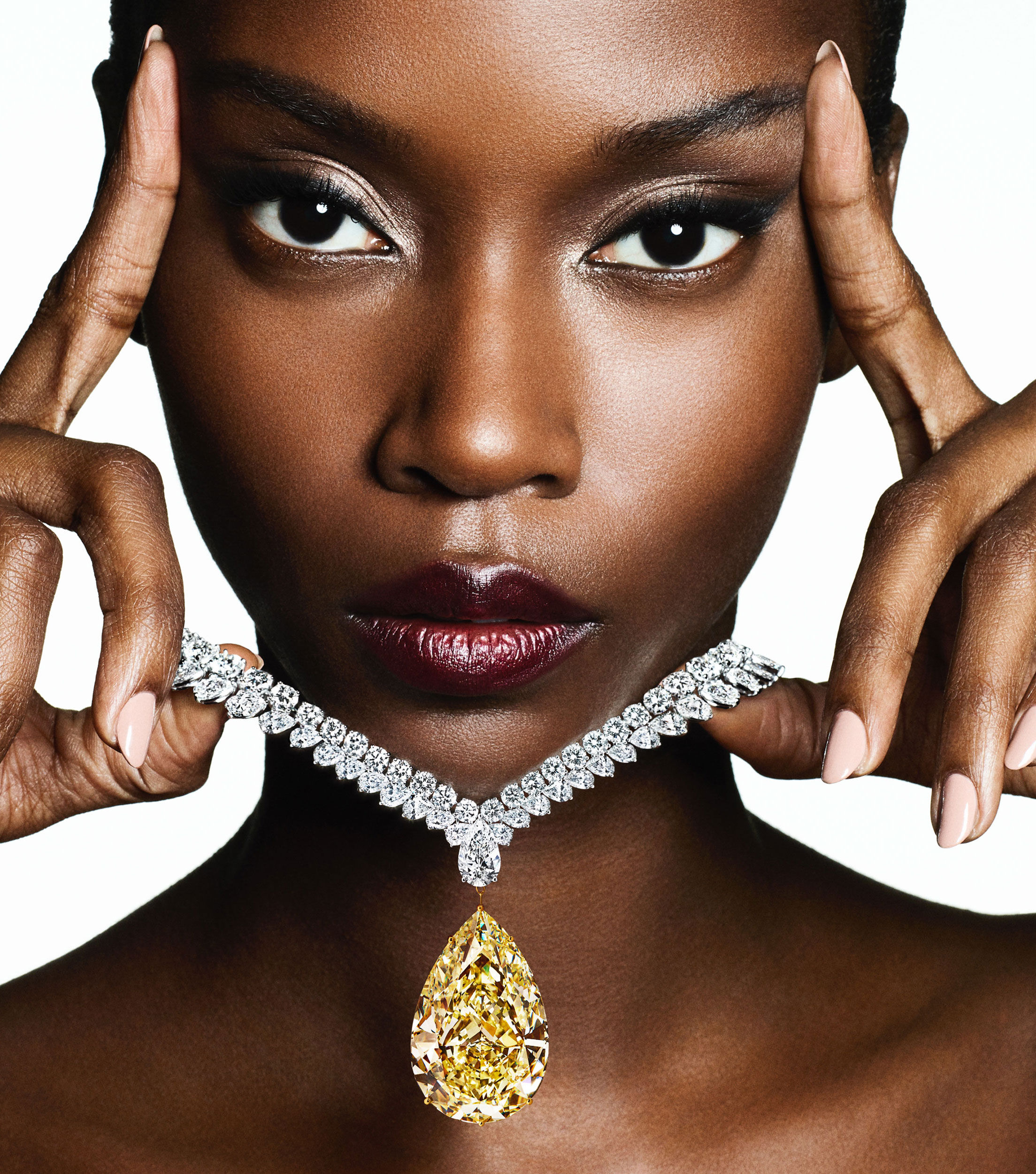 Model wears a Graff high jewellery yellow and white diamond necklace
