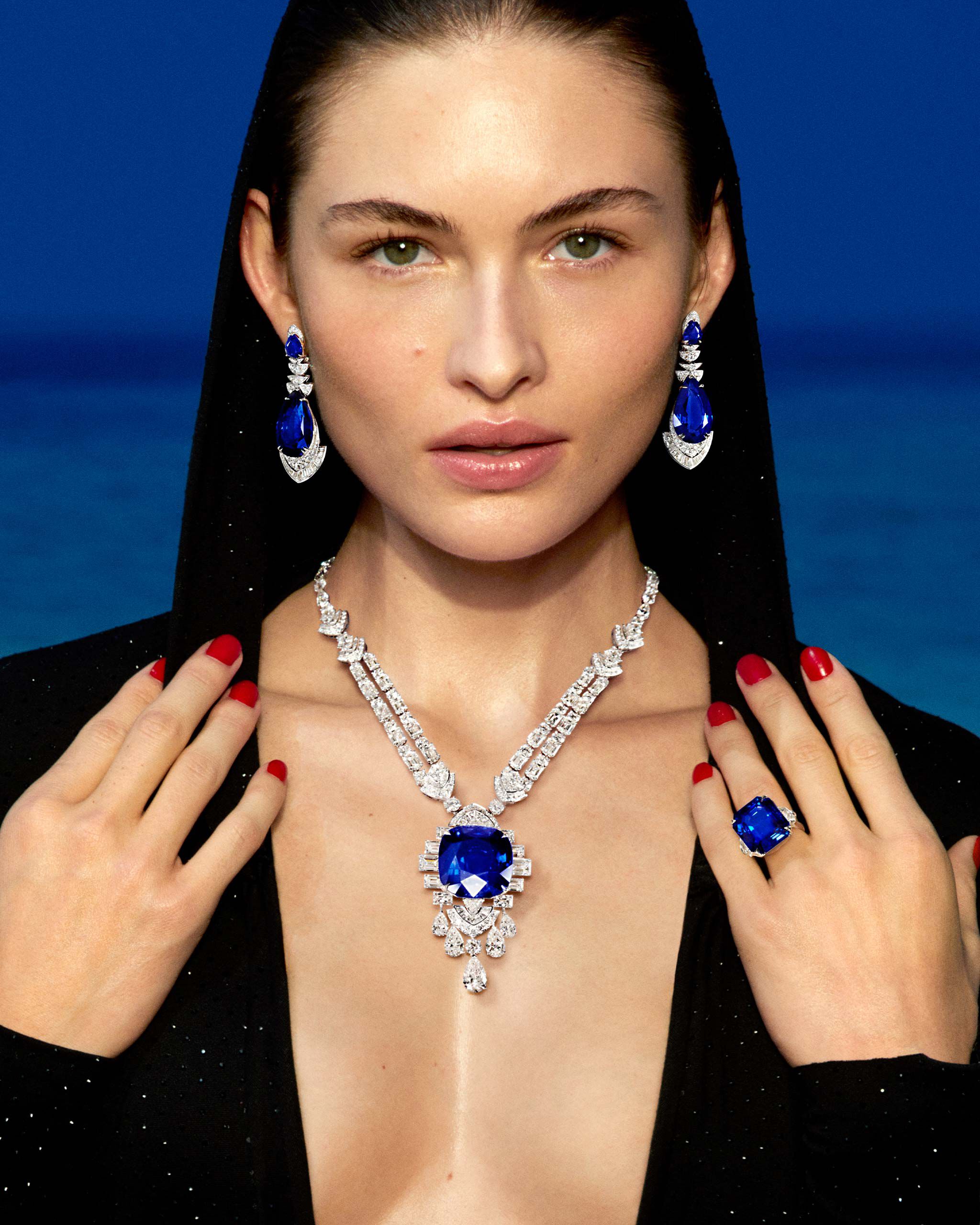 Model wearing Graff sapphire and white diamond high jewellery