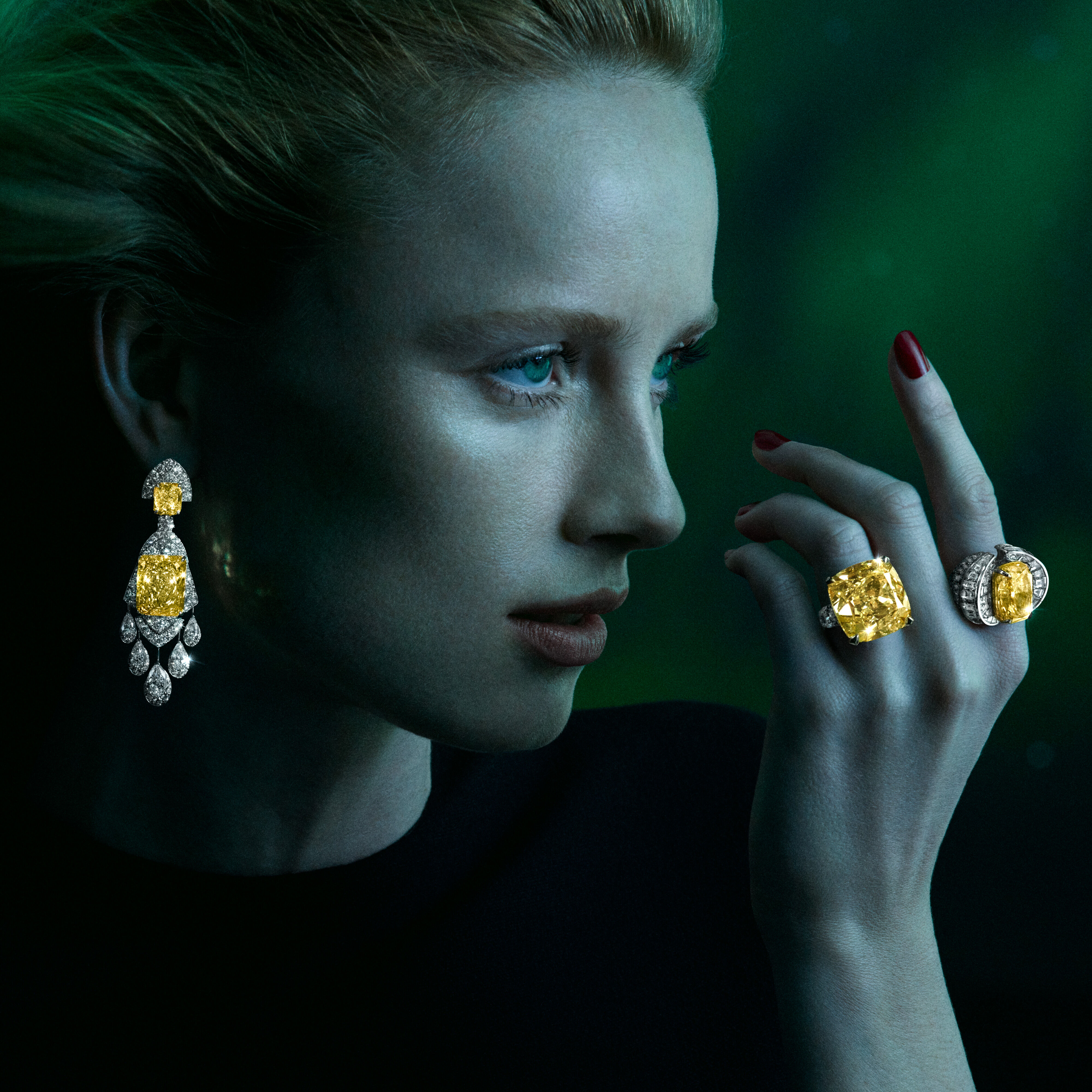 Image of model wearing Graff Galaxia Yellow Diamond Earrings and Rings 