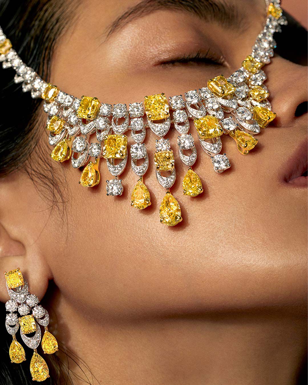 Model wears a Graff high jewellery yellow and white diamond necklace