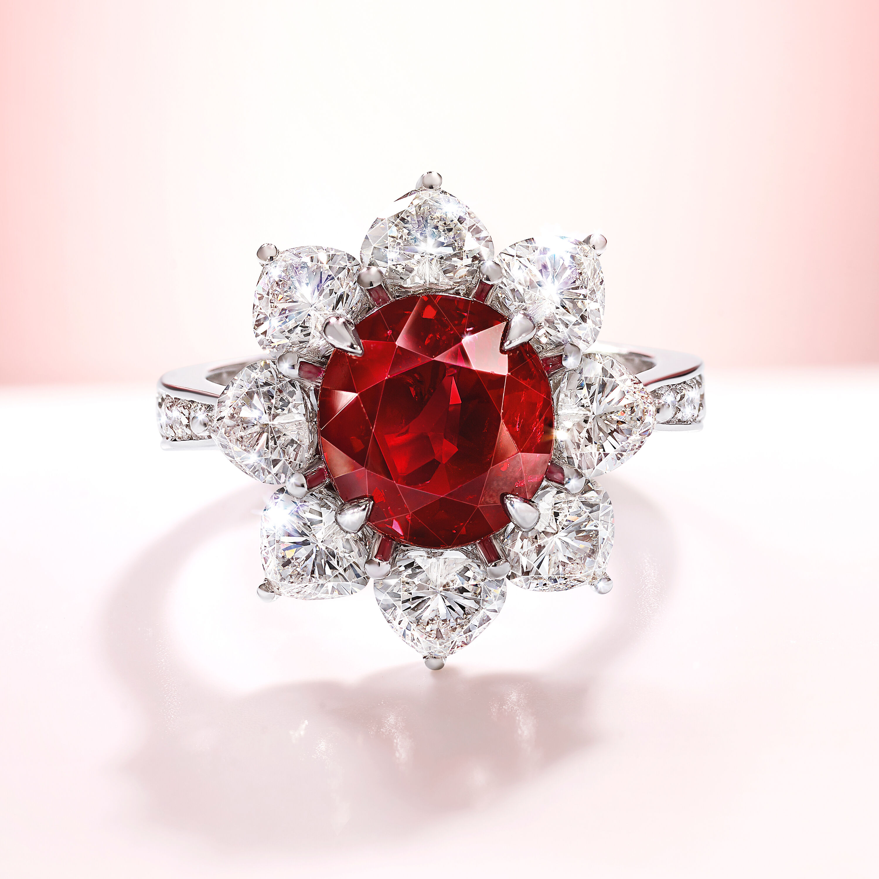 An oval ruby and white diamond ring by Graff