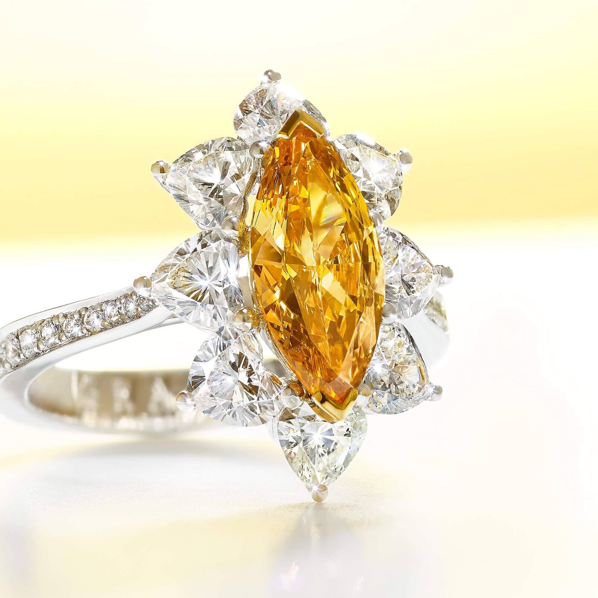 A 1 carat Fancy Vivid Yellow Orange marquise diamond Graff ring