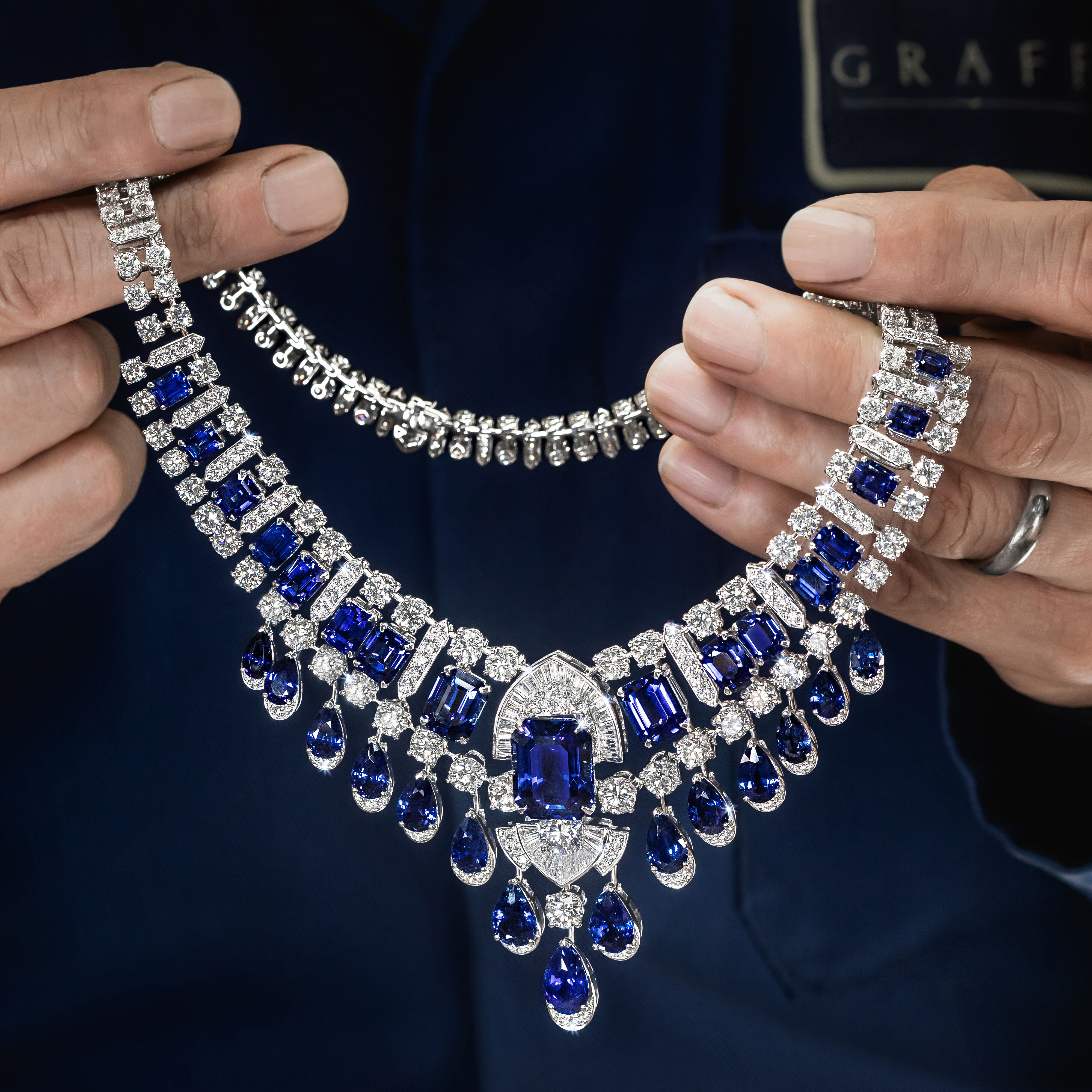 Image of Graff High Jewellery Sapphire and White Diamond necklace being finished in Graff Workshop 