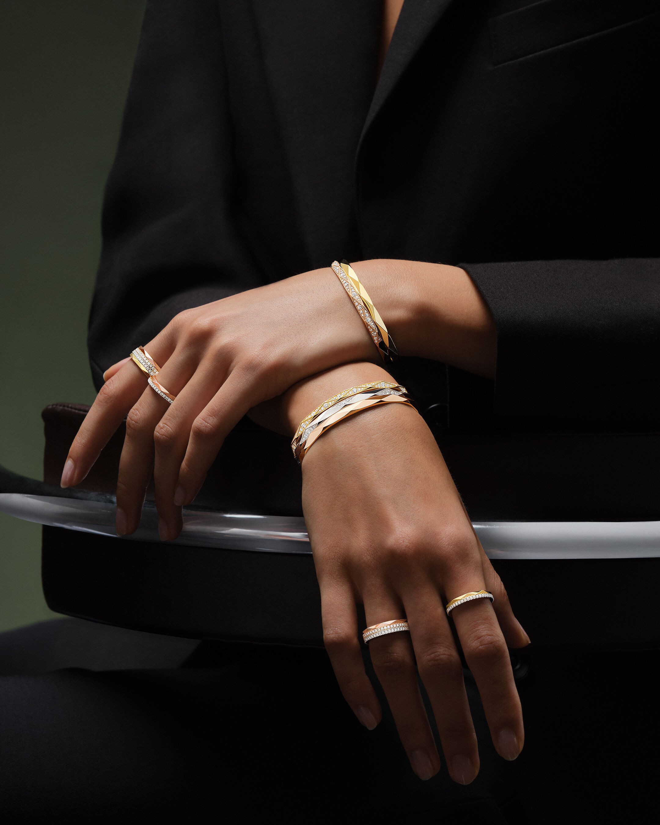 Image shows model wearing Laurence Graff Signature rings and bangles