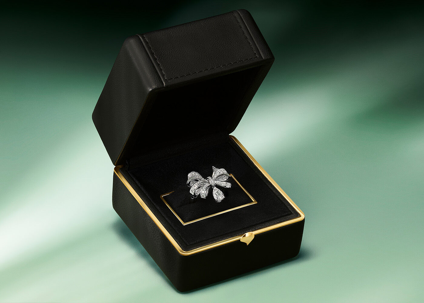 Image shows Graff Tilda's Bow ring in a signature box