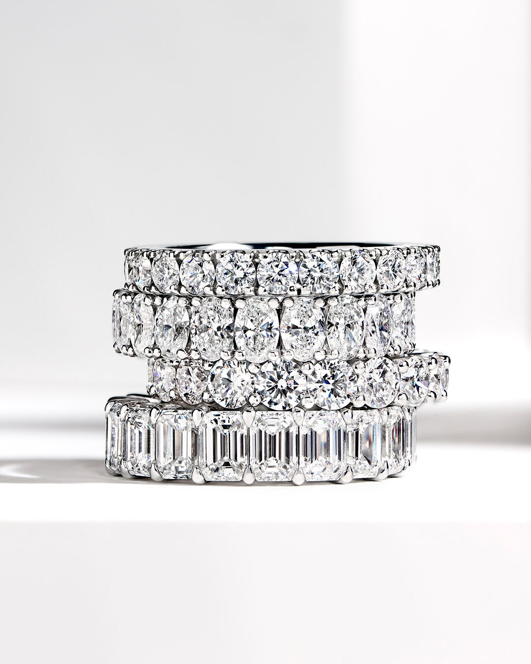 Laurence Graff Signature, image shows model hand wearing Laurence Graff Signature Rings and Bangles