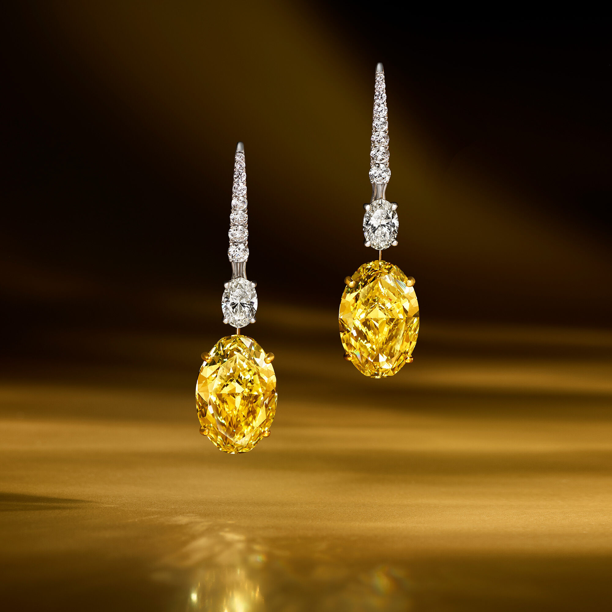 A pair of Graff yellow and white diamond high jewellery earrings
