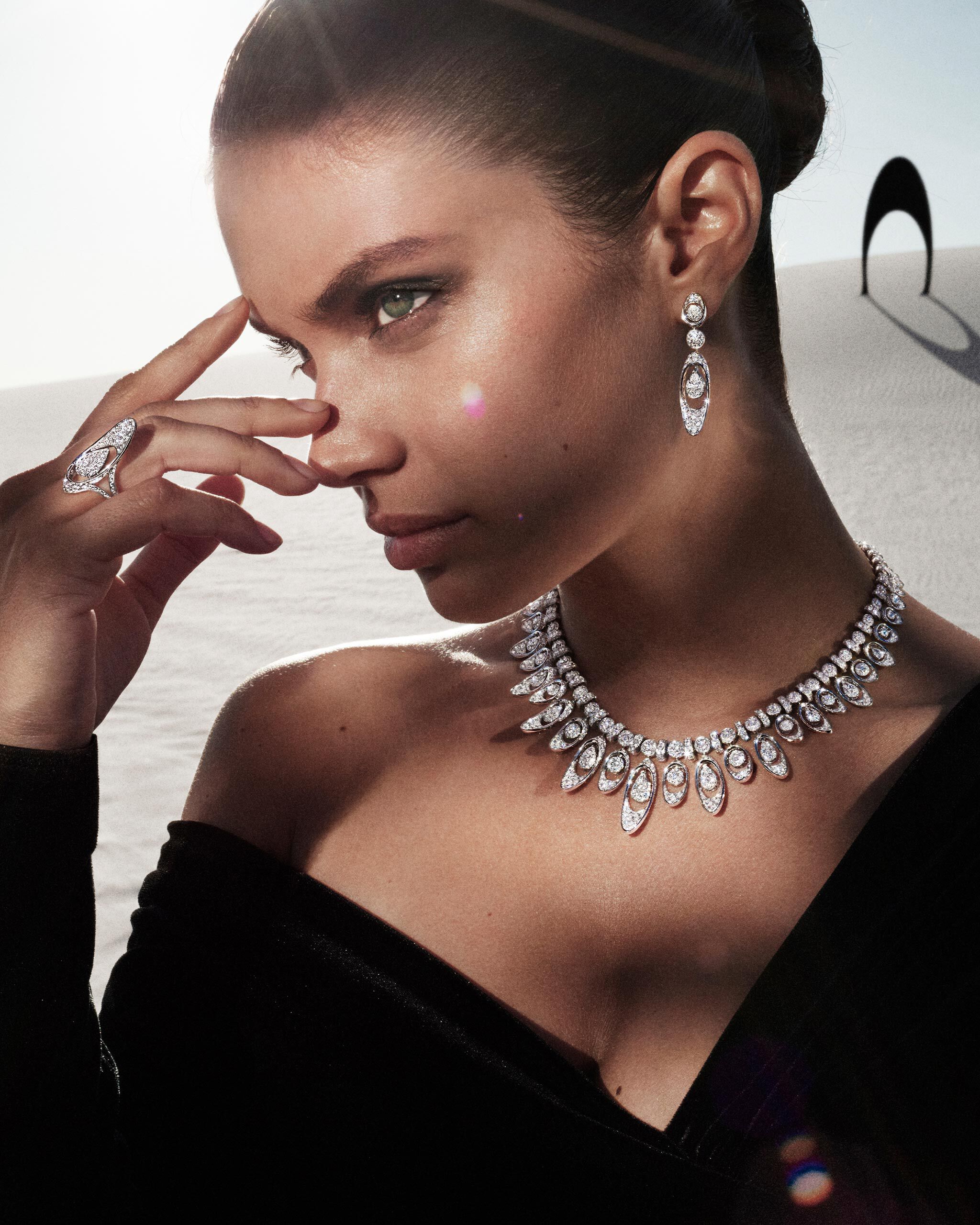 The Graff Gateway motif is transformed into a dramatic diamond fringe on a sensational necklace and earrings